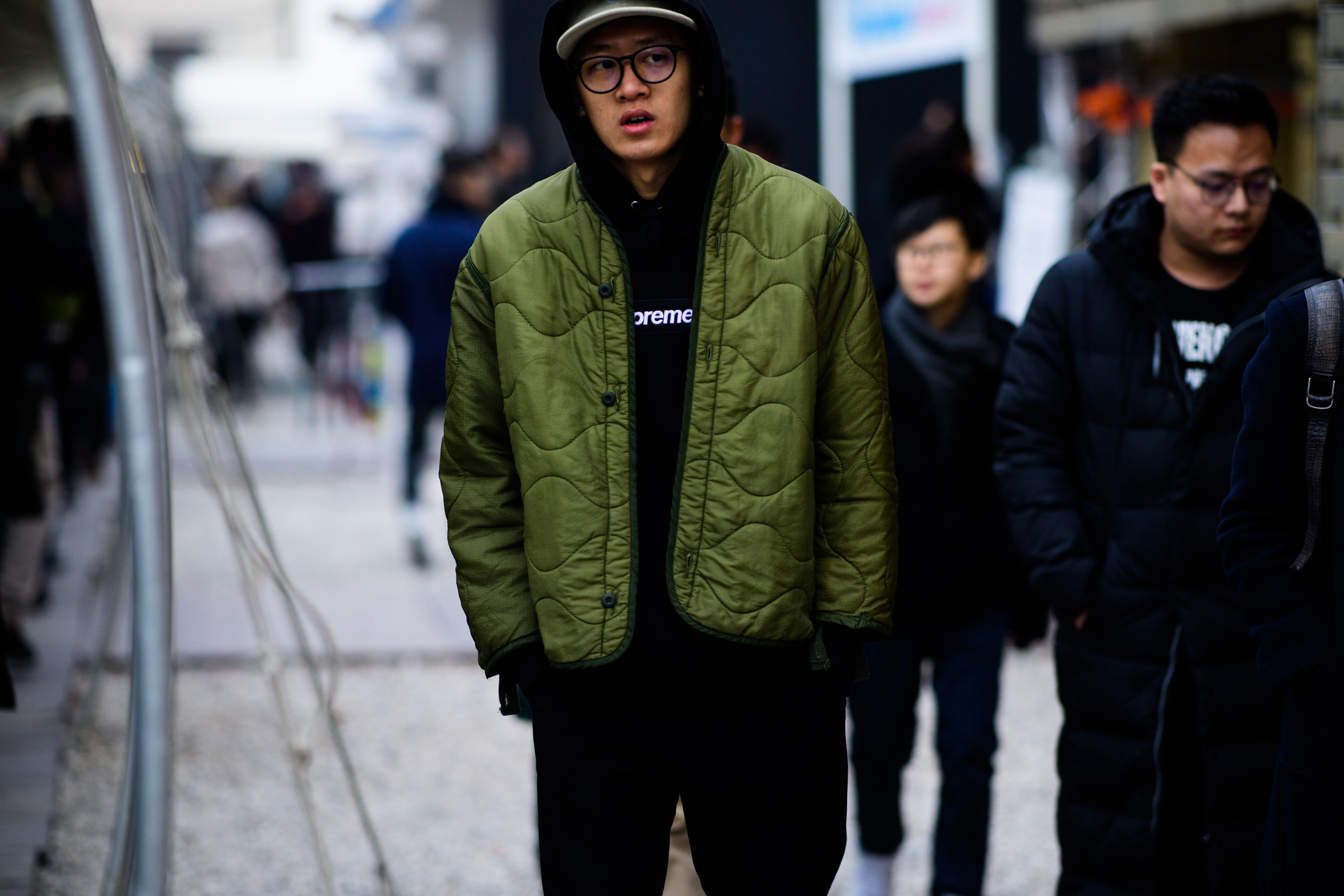 Man wearing supreme hoodie