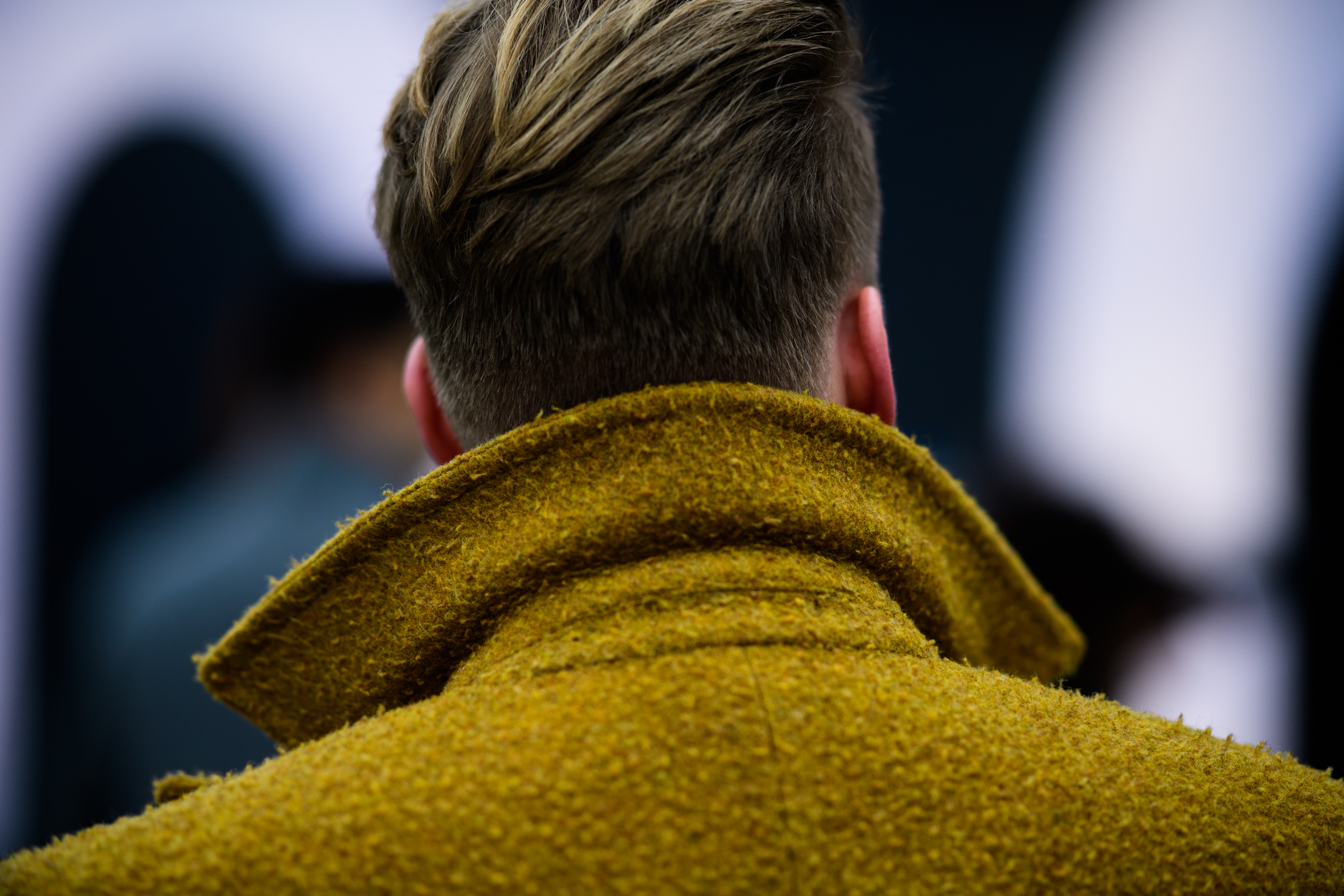 Men wearing yellow coat