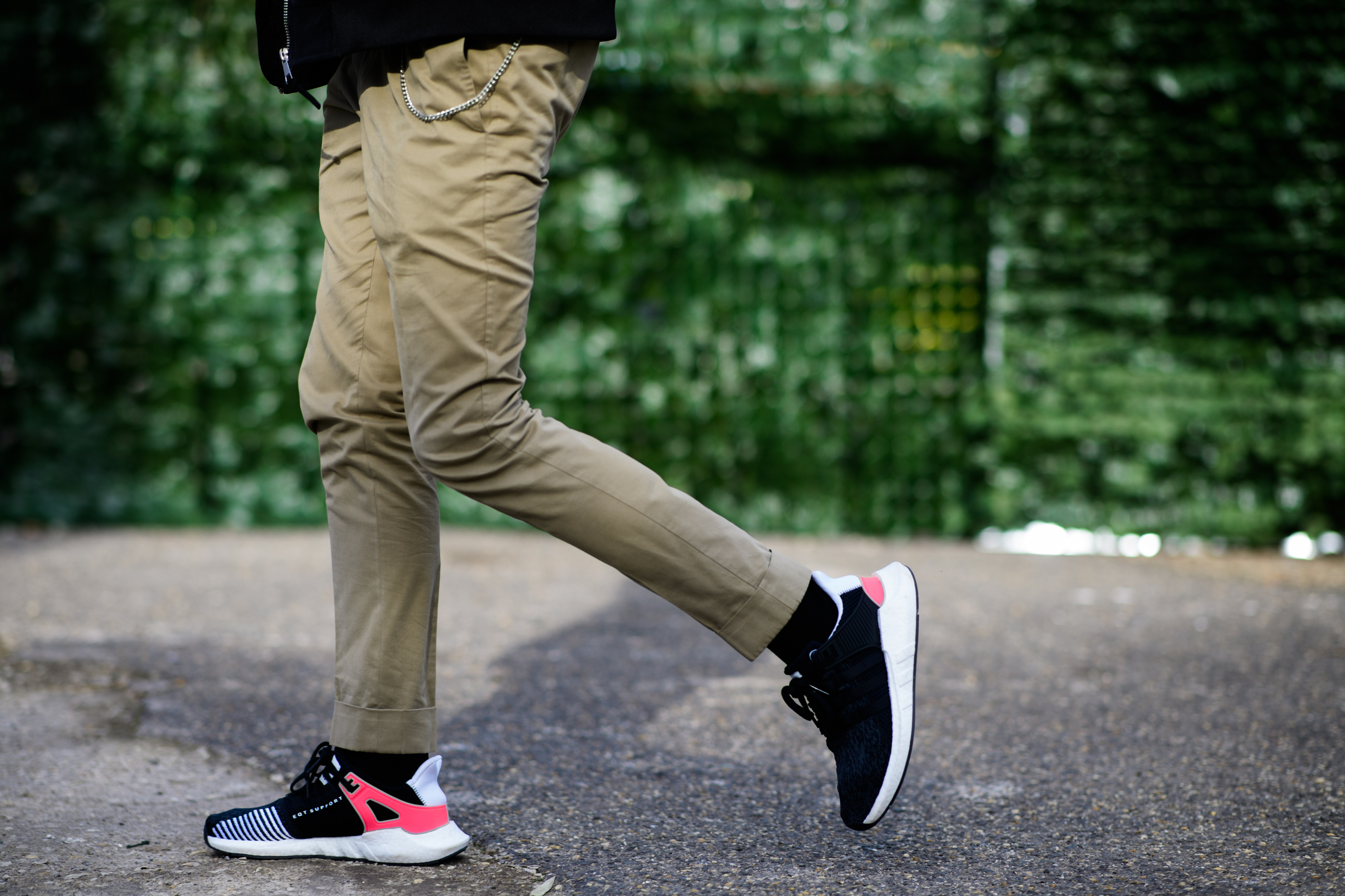 Man wearing adidas shose