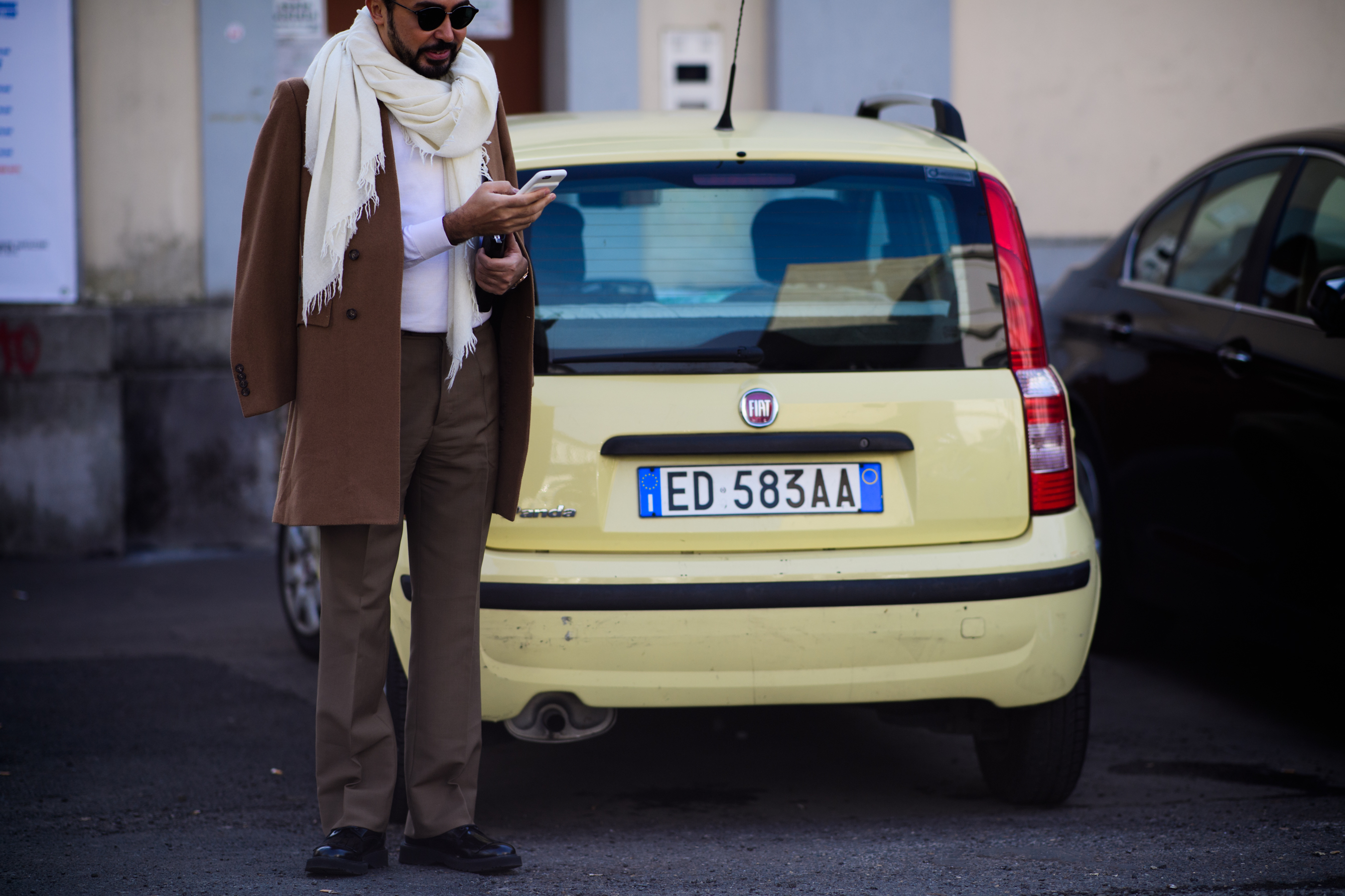 Man wearing brown clothes