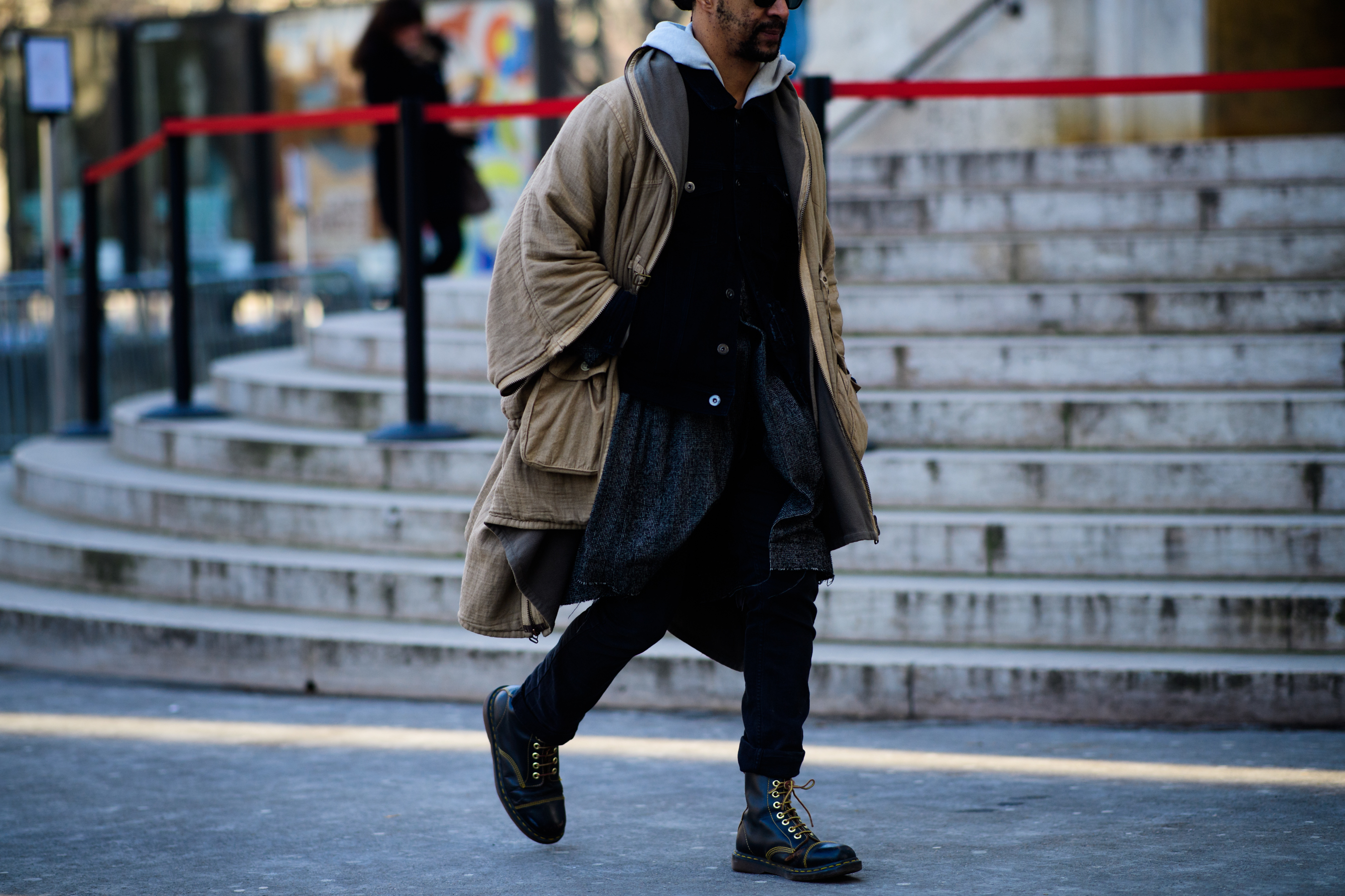 Man wearing brown jacket