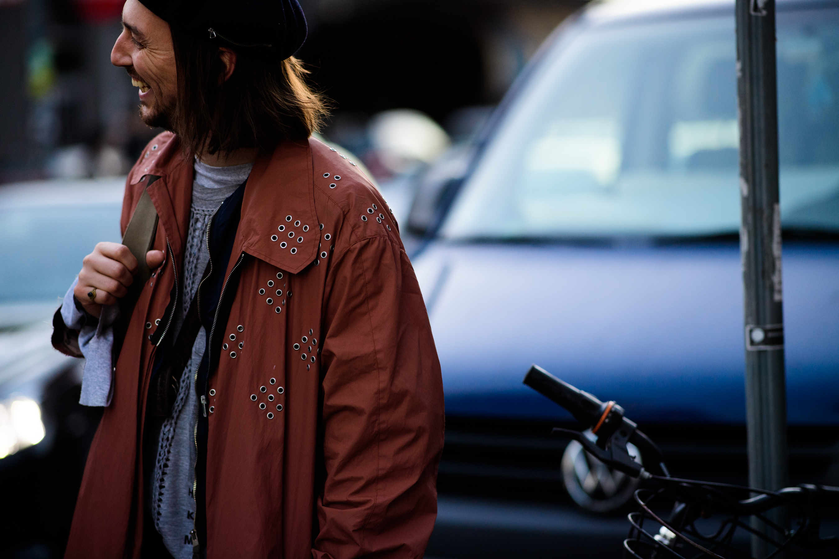 Man with long hair wearing jacket