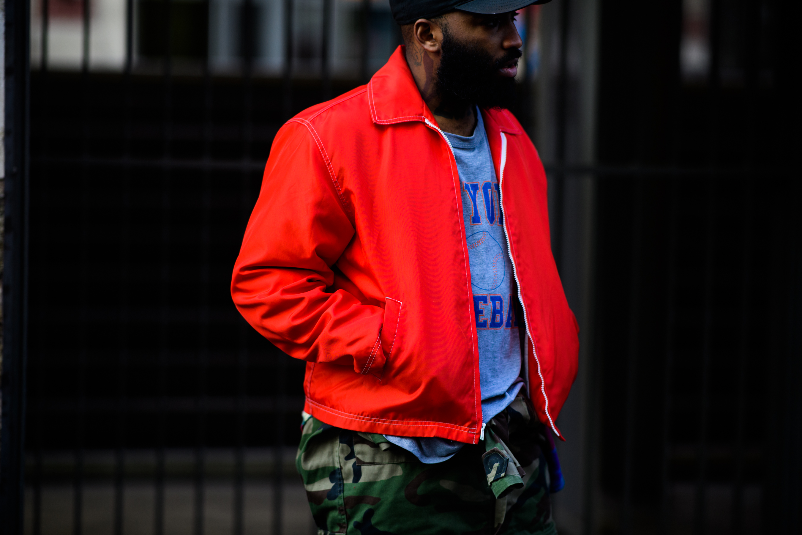 Man wearing orange jacket