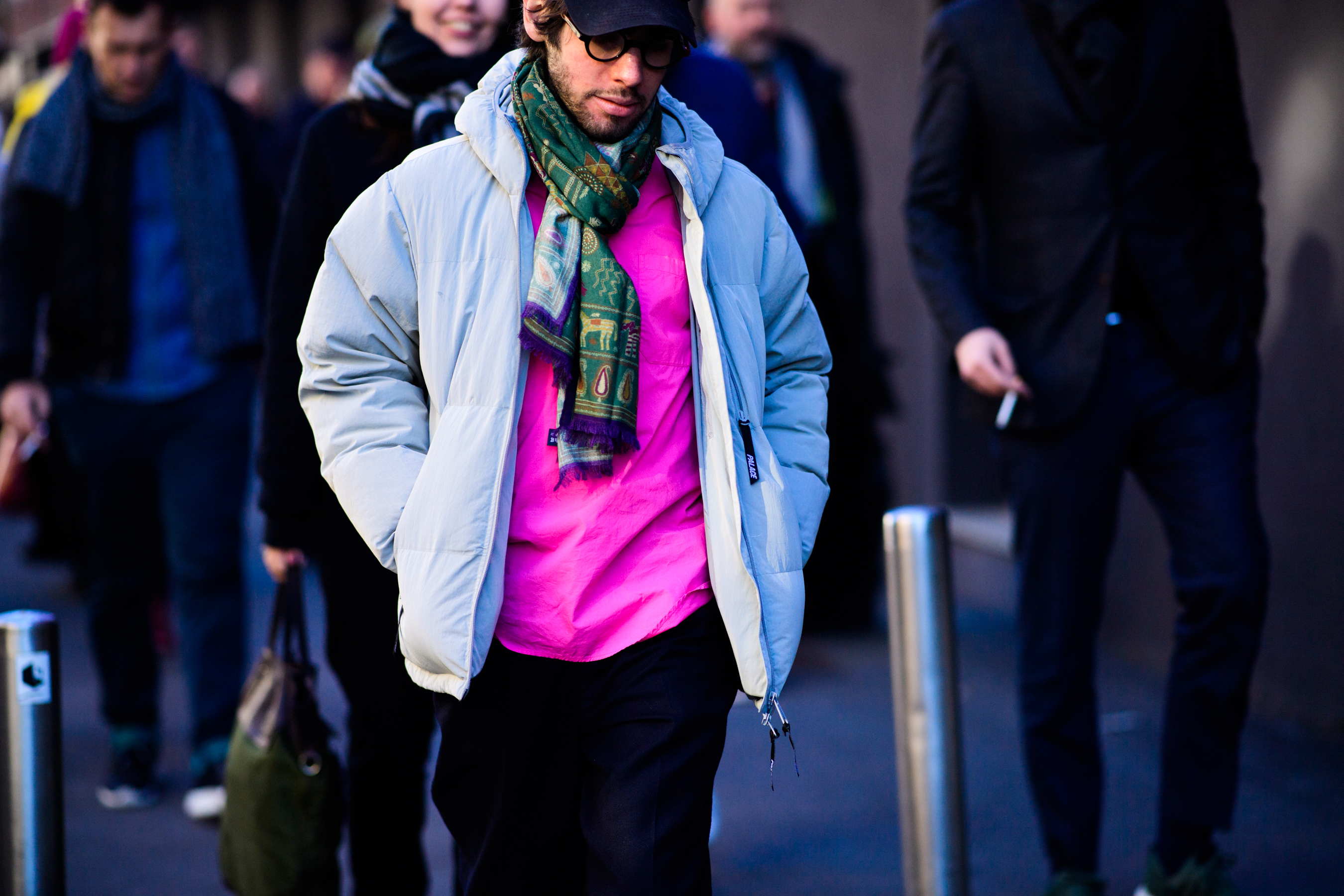 Man wearing pink and blue clothes