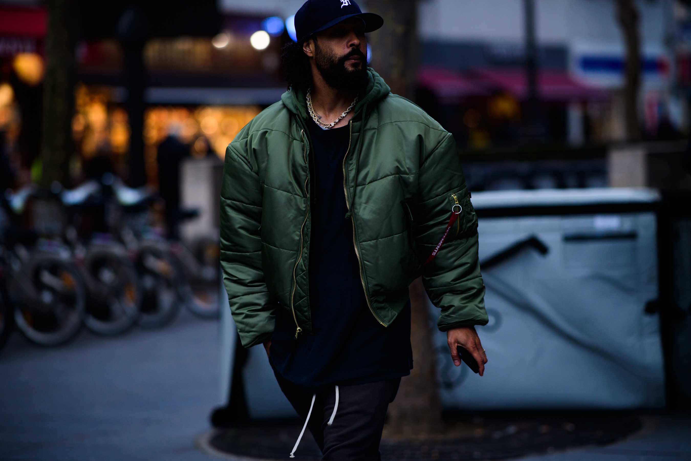Man wearing green vetements jacket