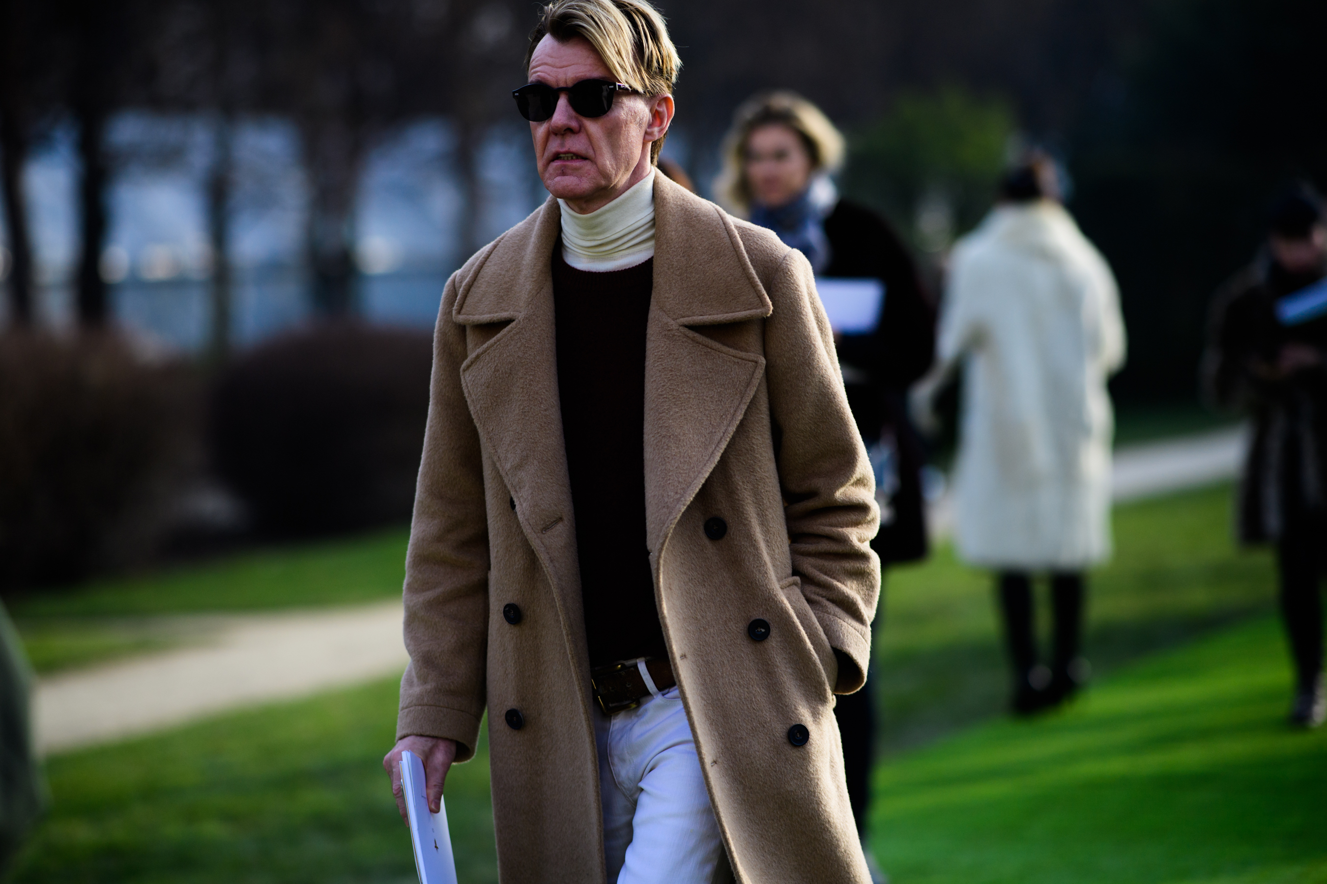 Man wearing brown coat