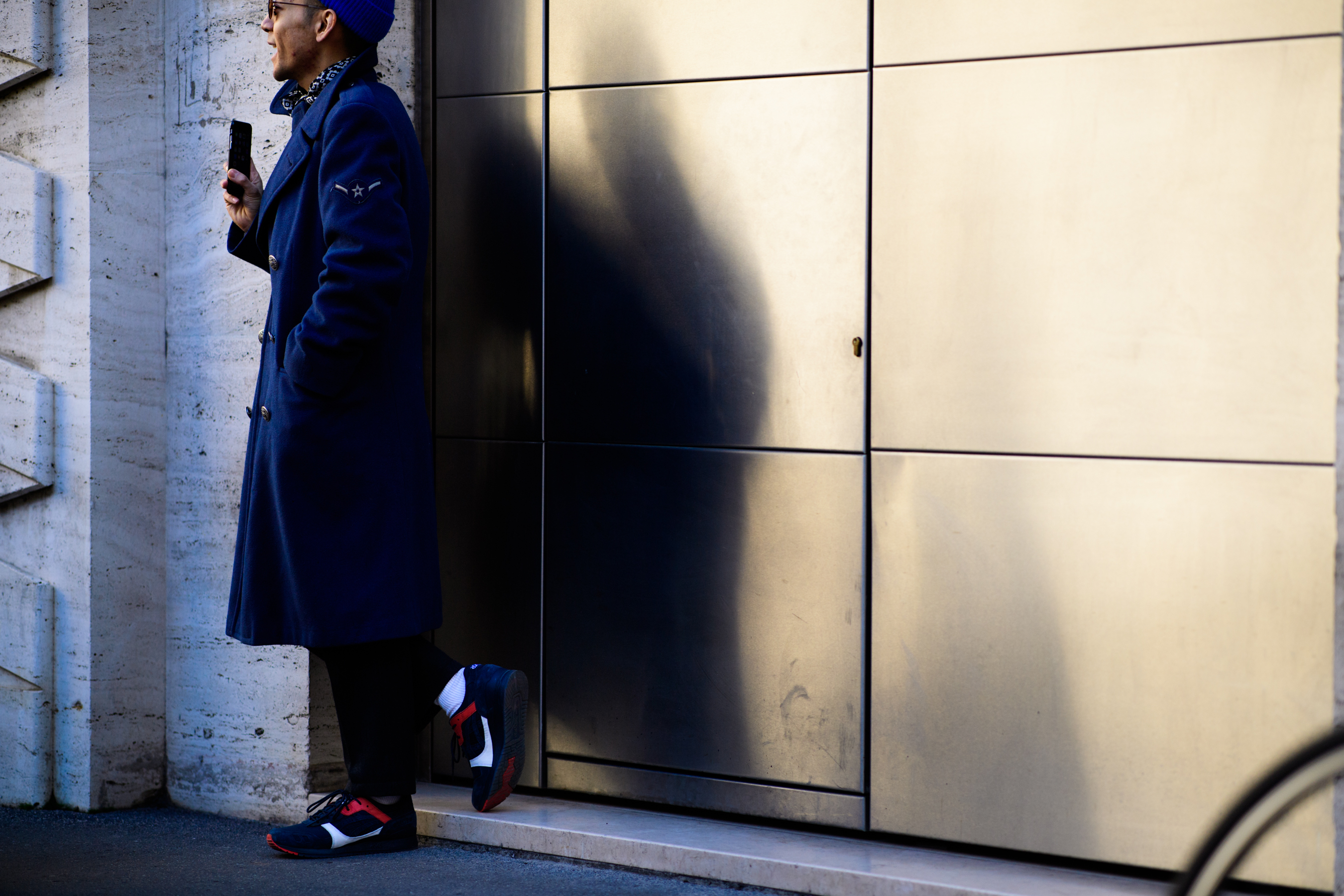 Man wearing blue coat