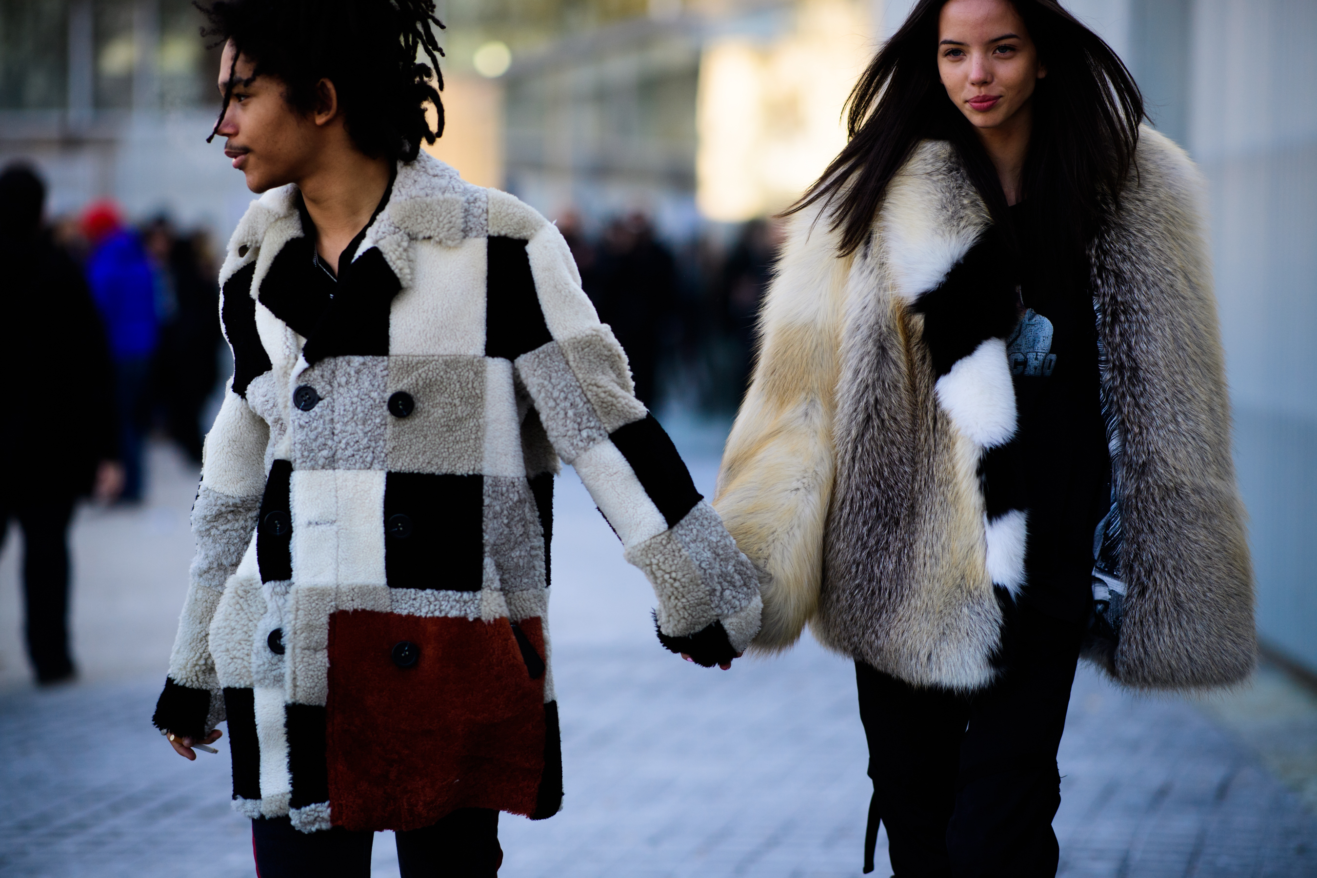 People wearing fur caots