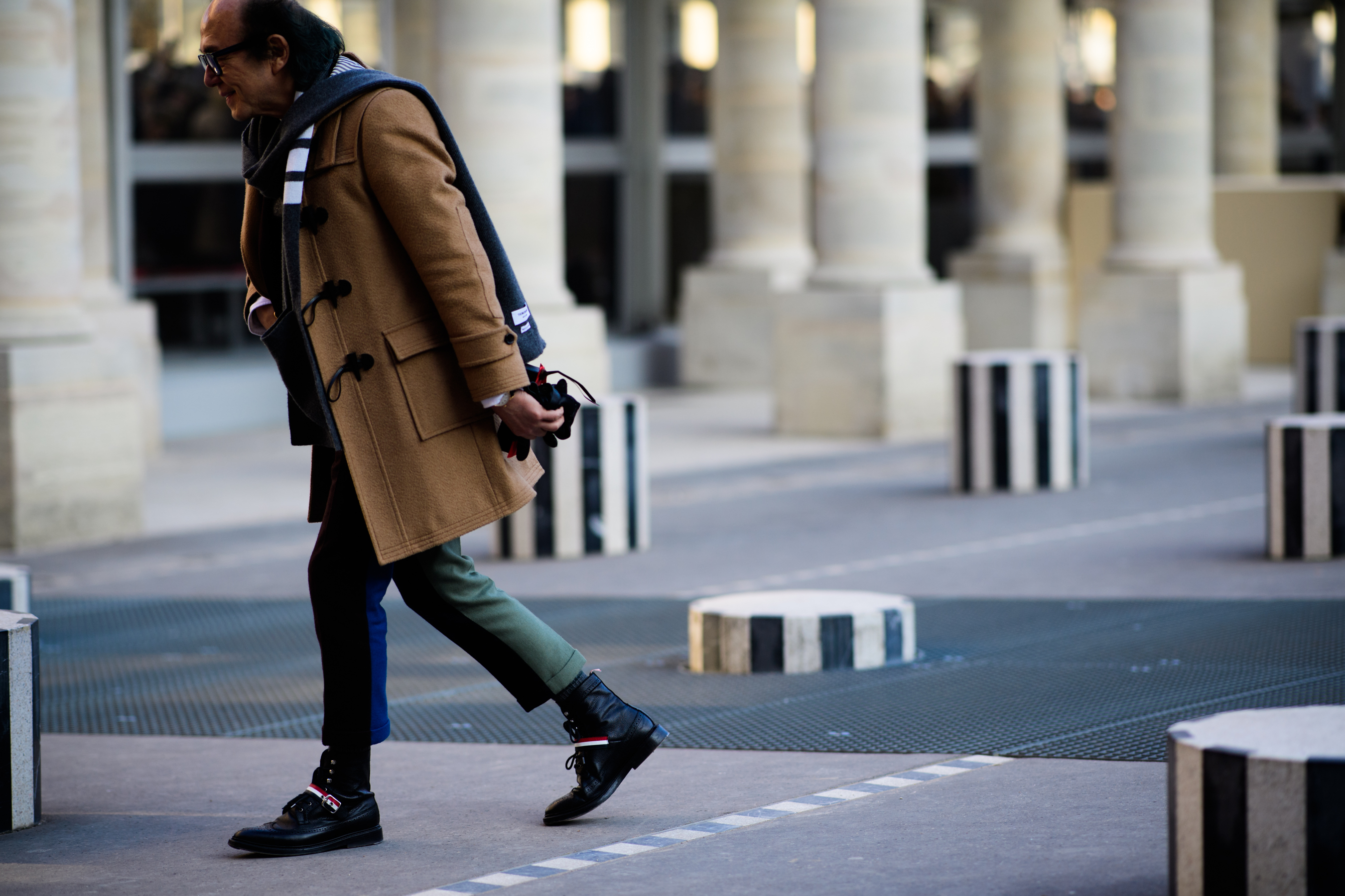 Man wearing brown coat