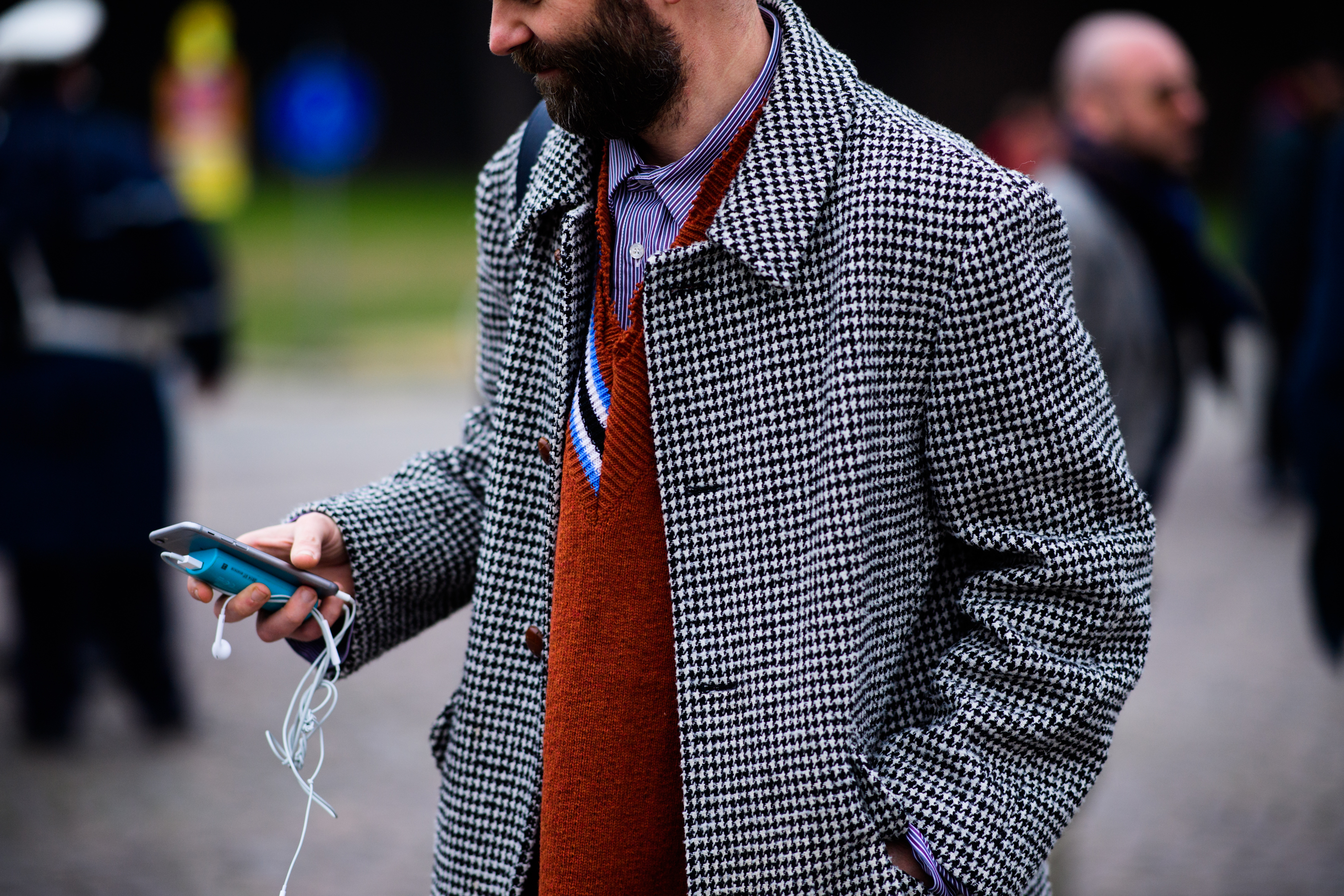 Man wearing Raf Simons under coat