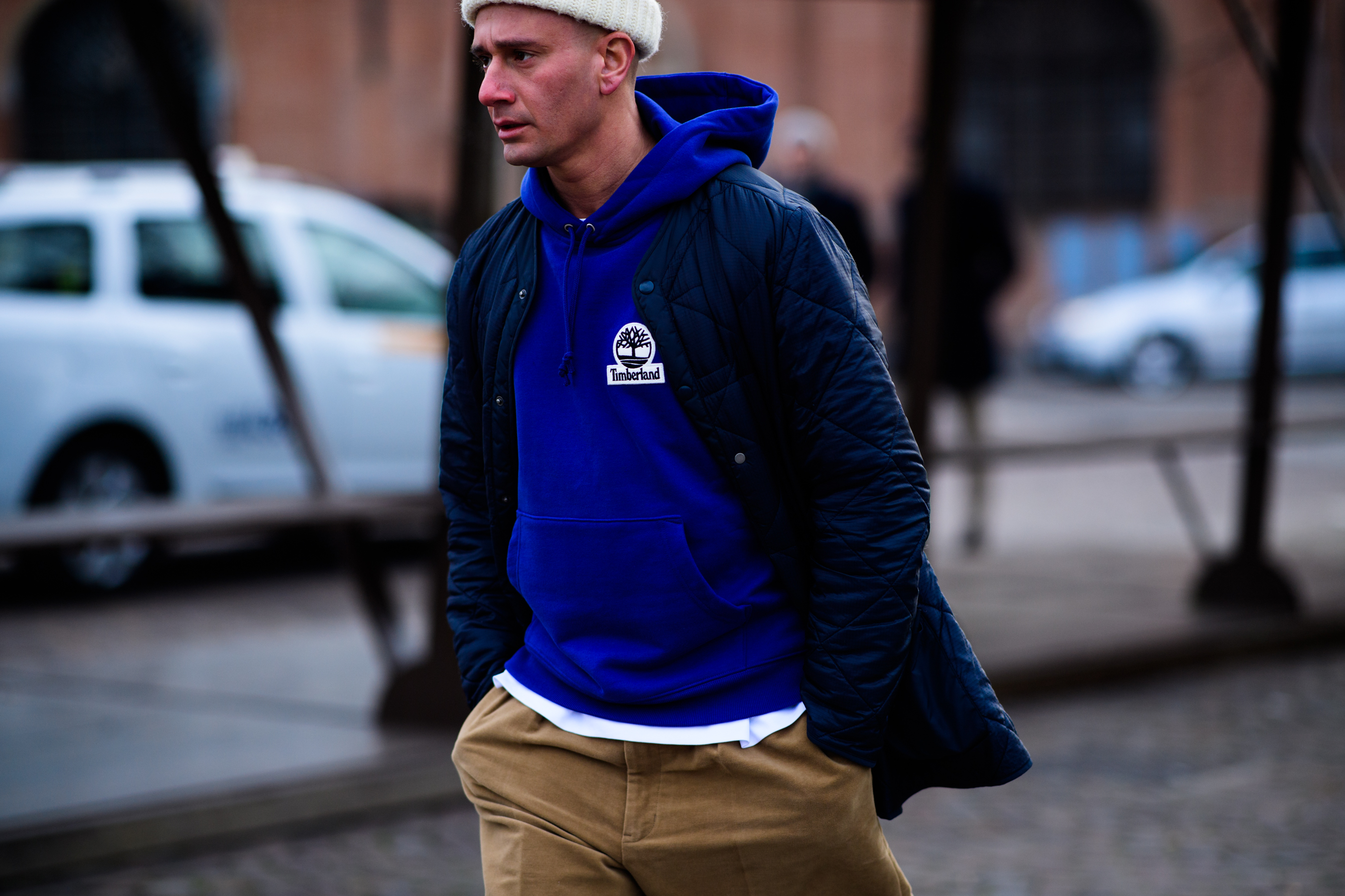 Man wearing blue Timberland hoodie