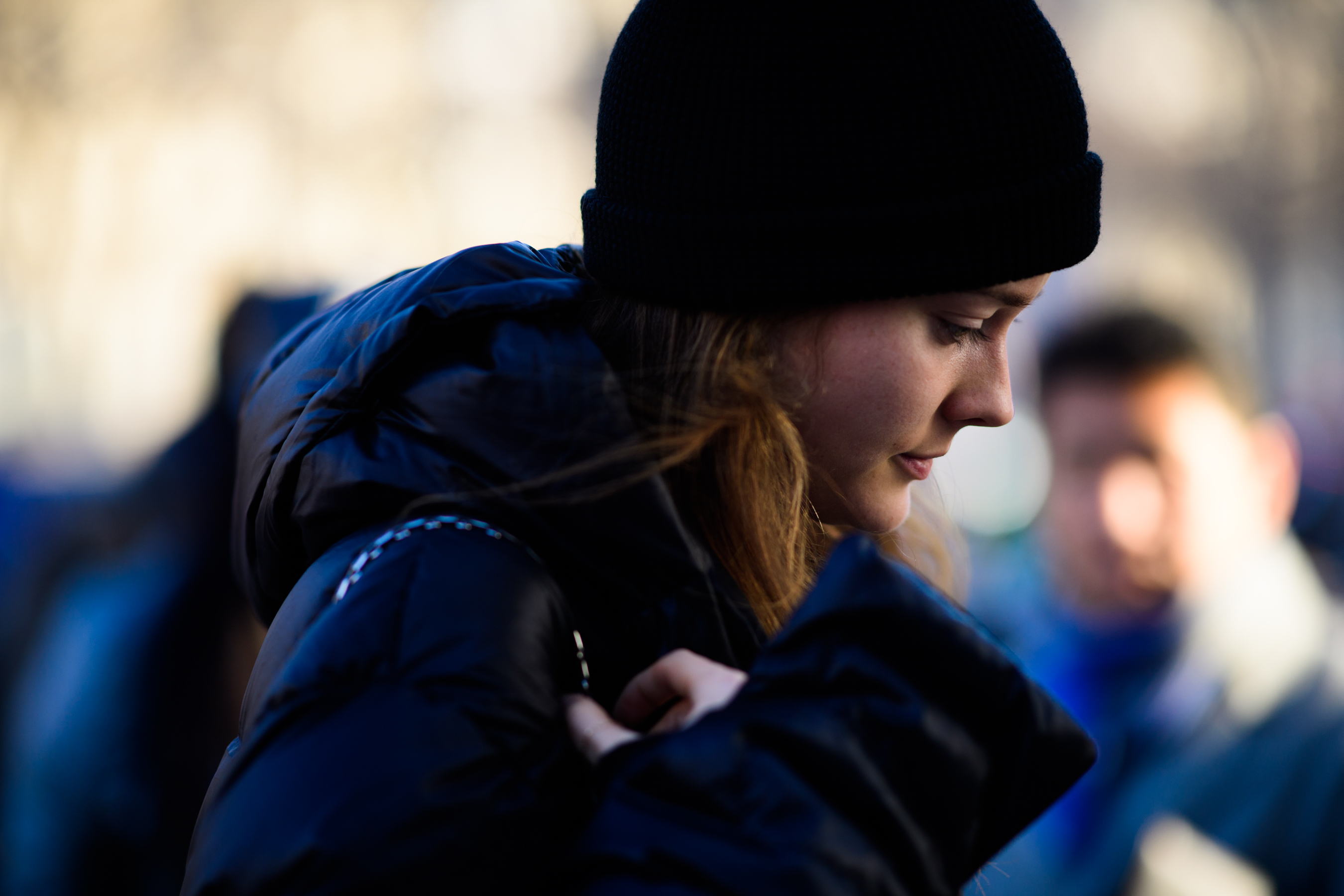 Woman wearing black hat