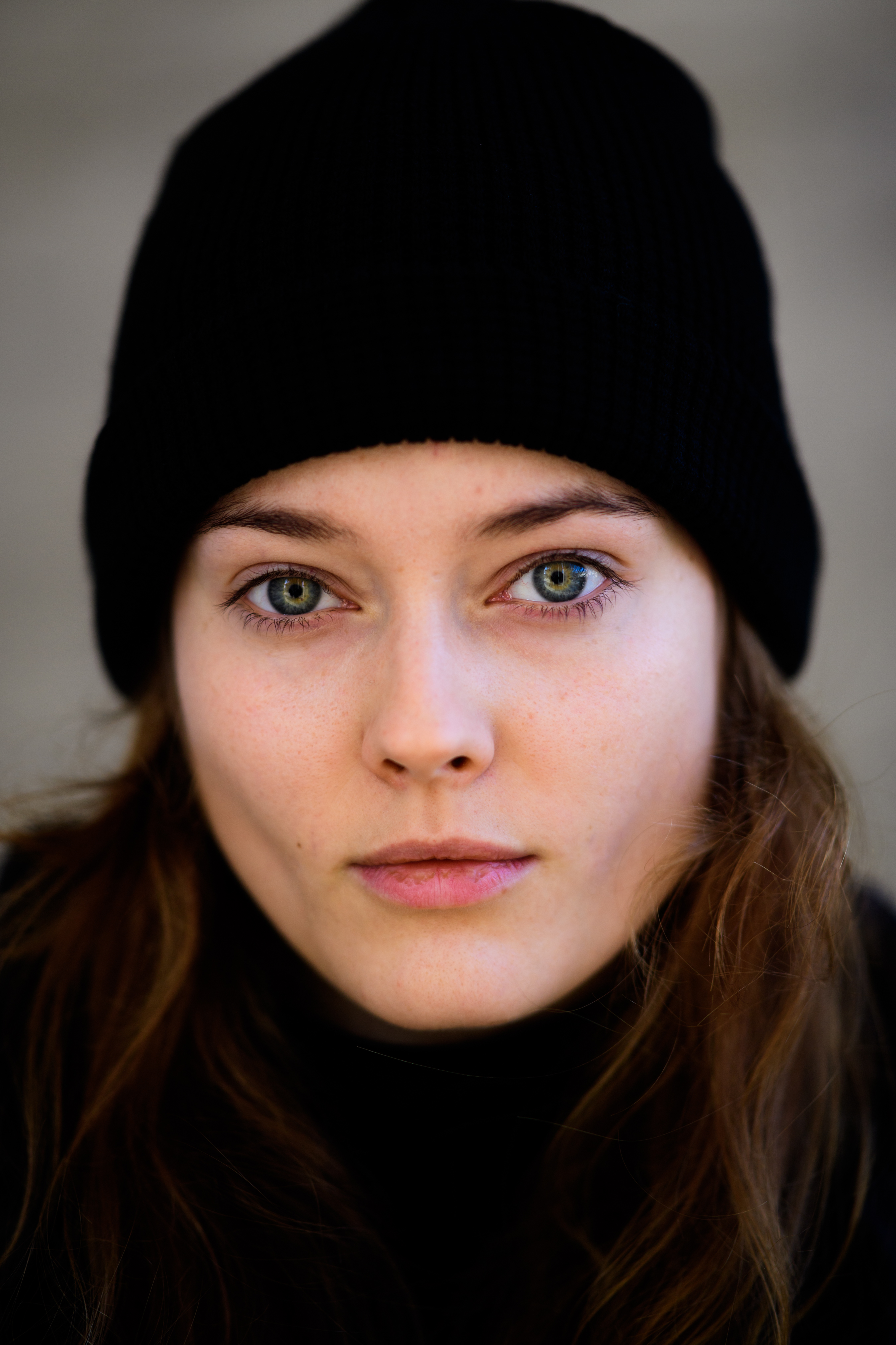 Portrait of woman with black hat