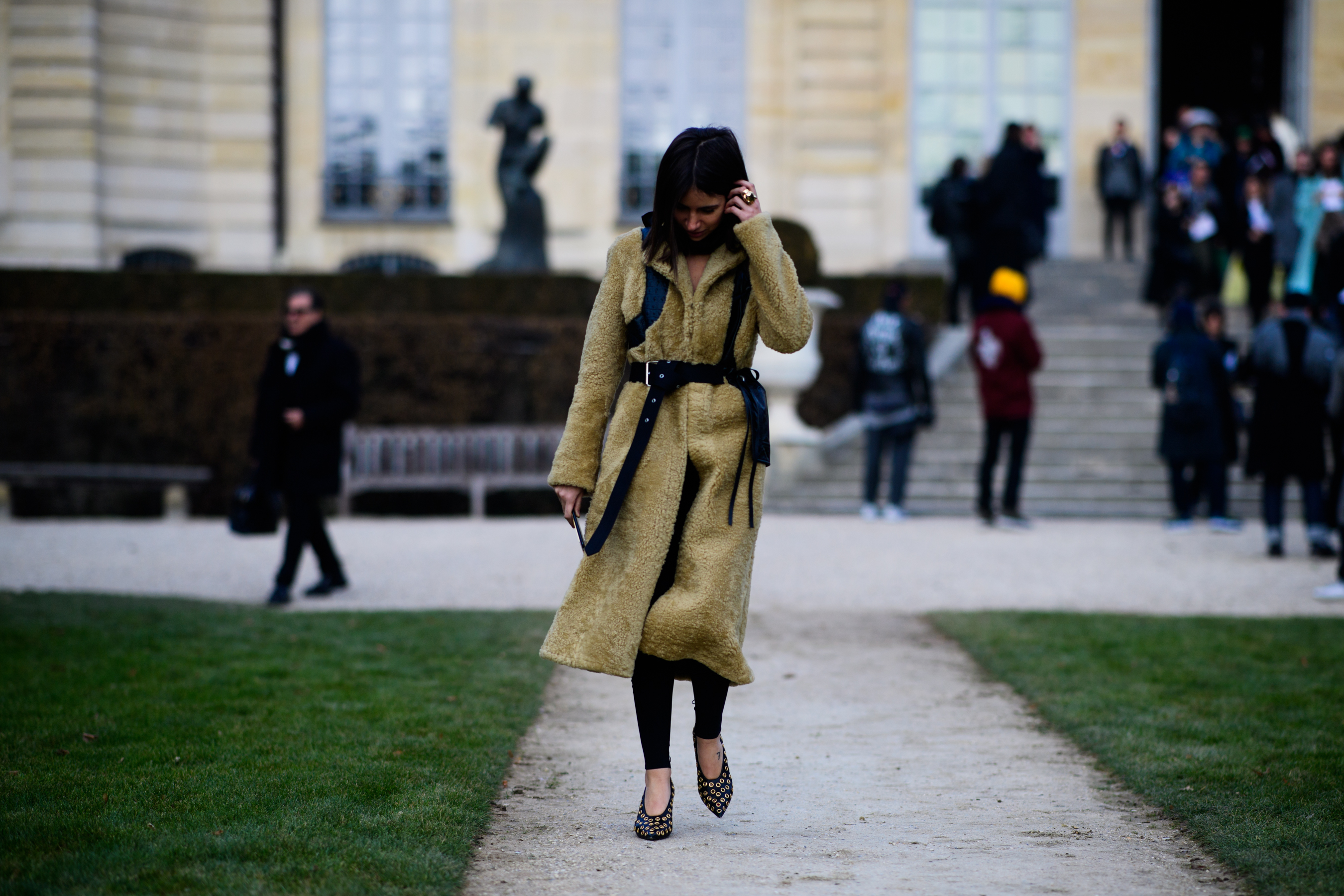 Woman wearing brown coat