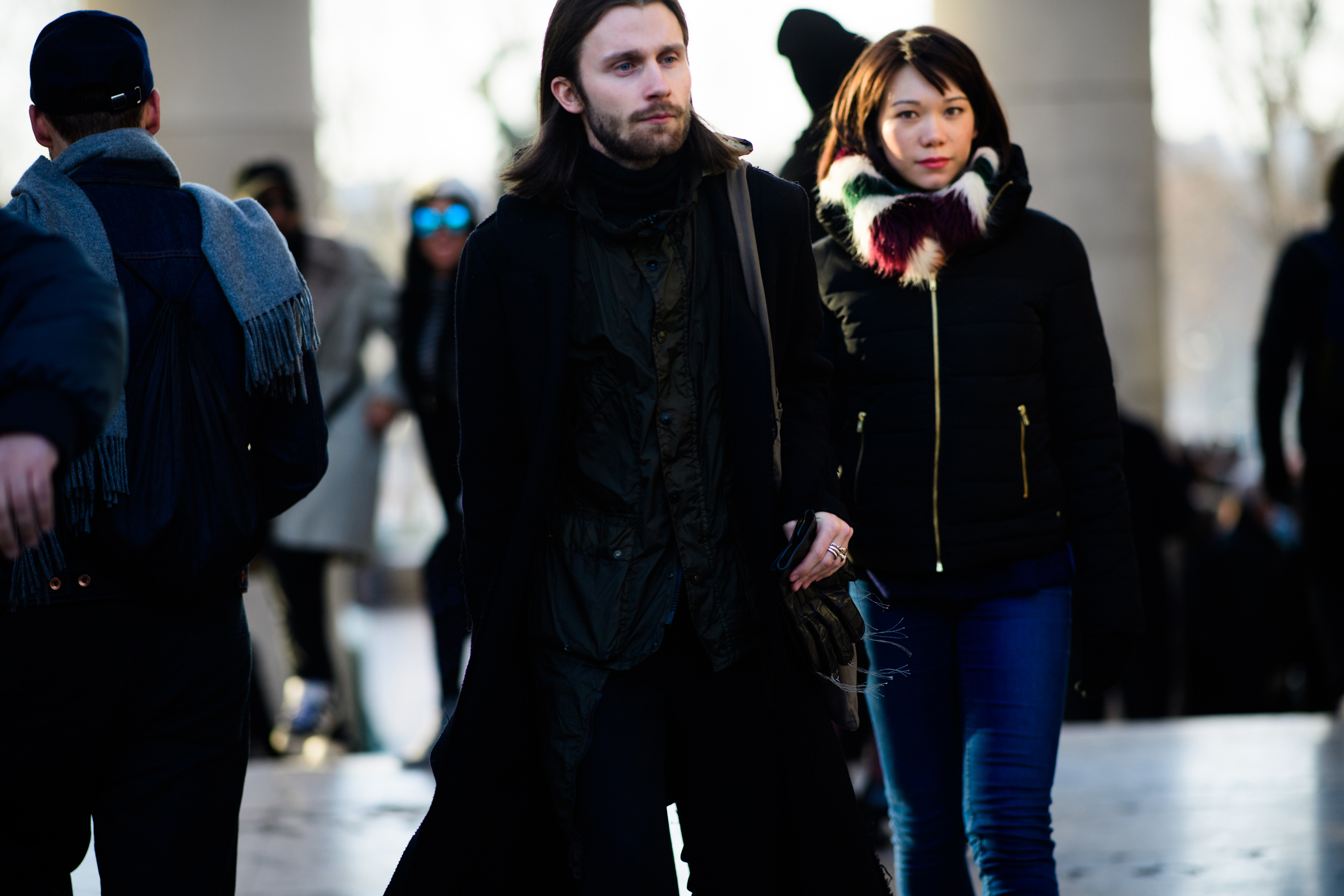Man with beard and long hair wearing black