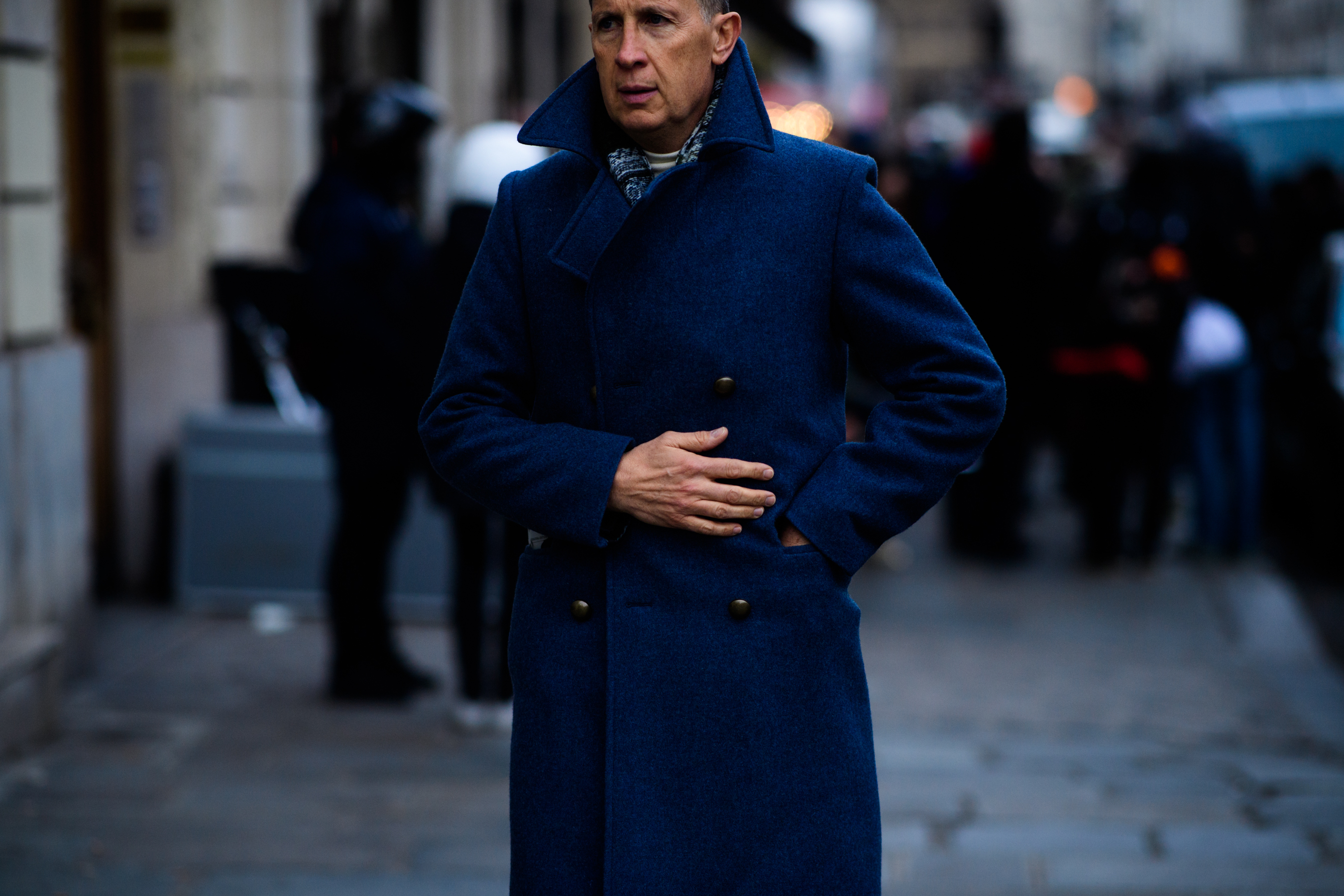 Man wearing blue coat