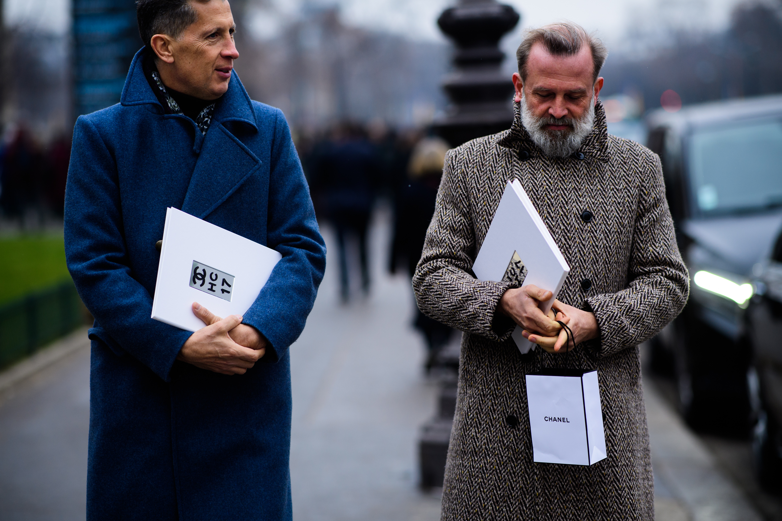 Old men wearing coats