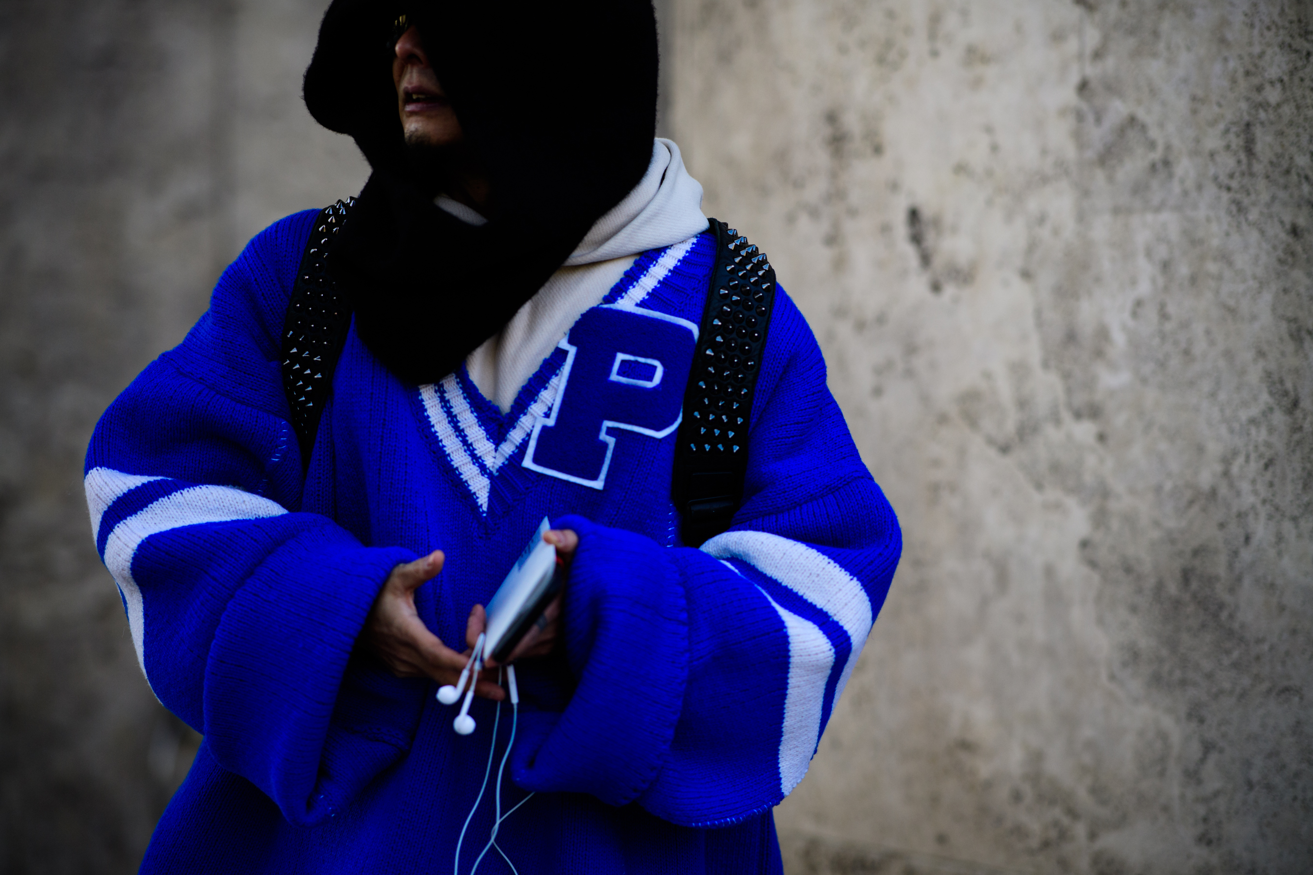 Woman wearing blue sweater