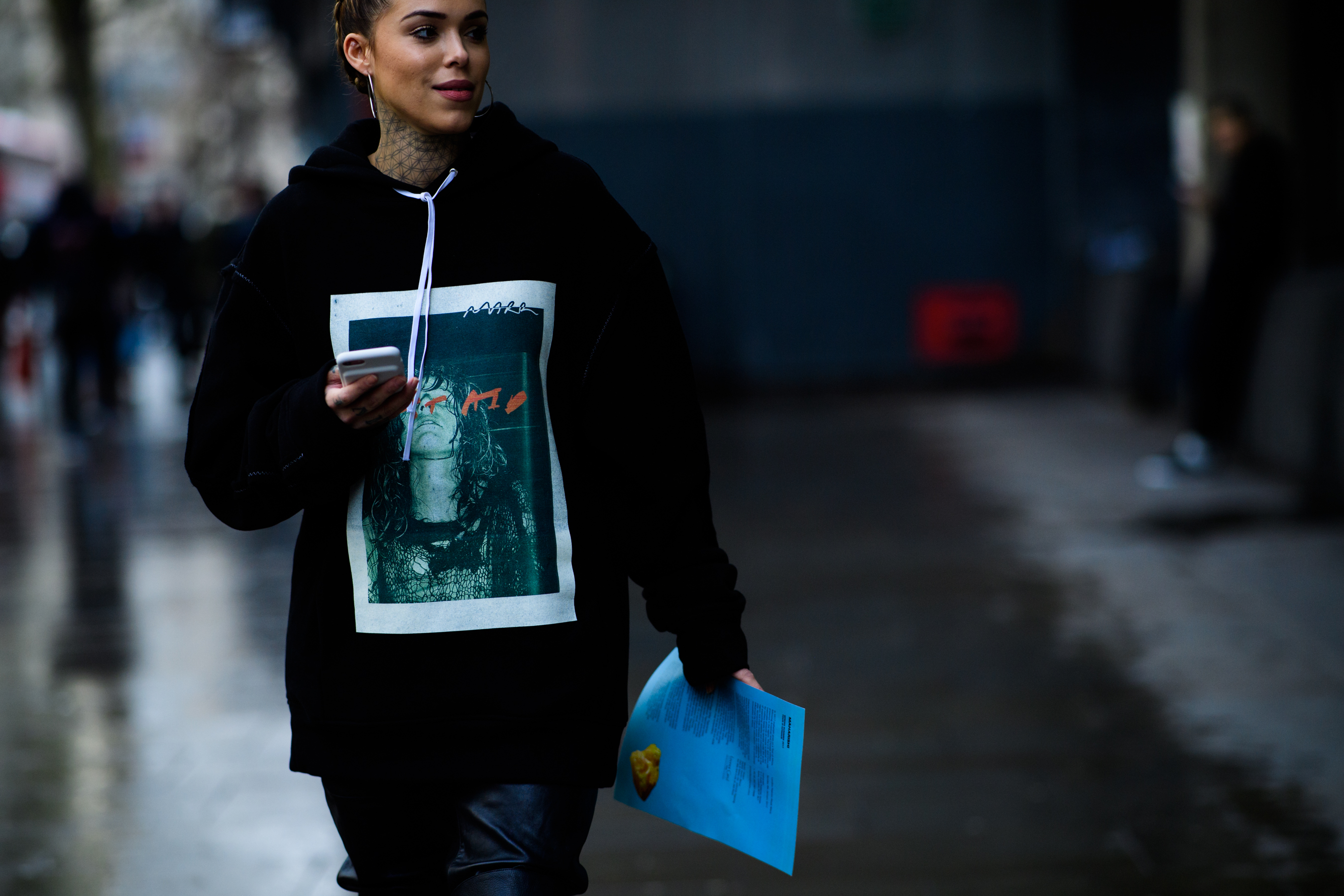Woman with tattoo on neck