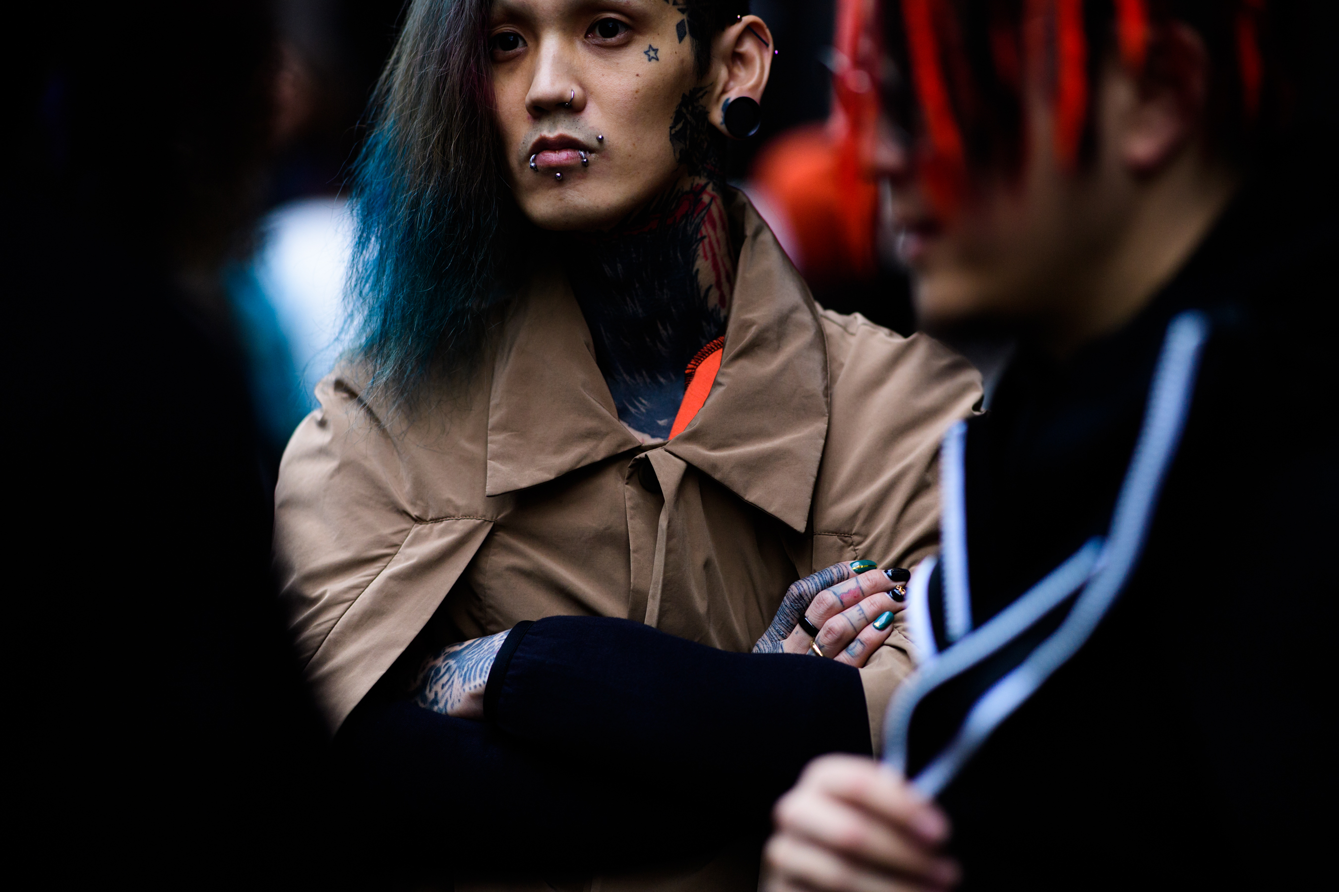 Asian man with tattoo