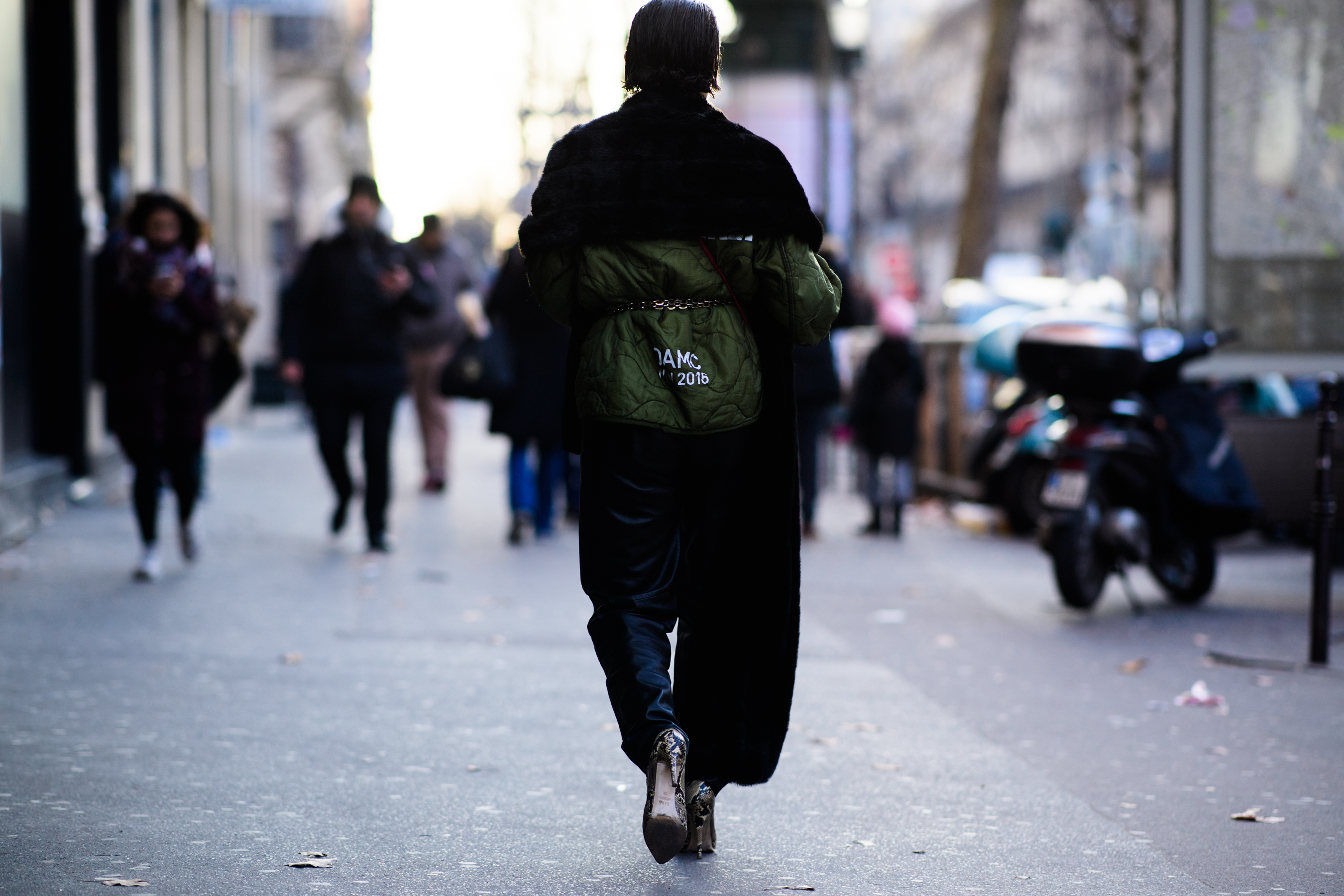 Woman wearing green jacket
