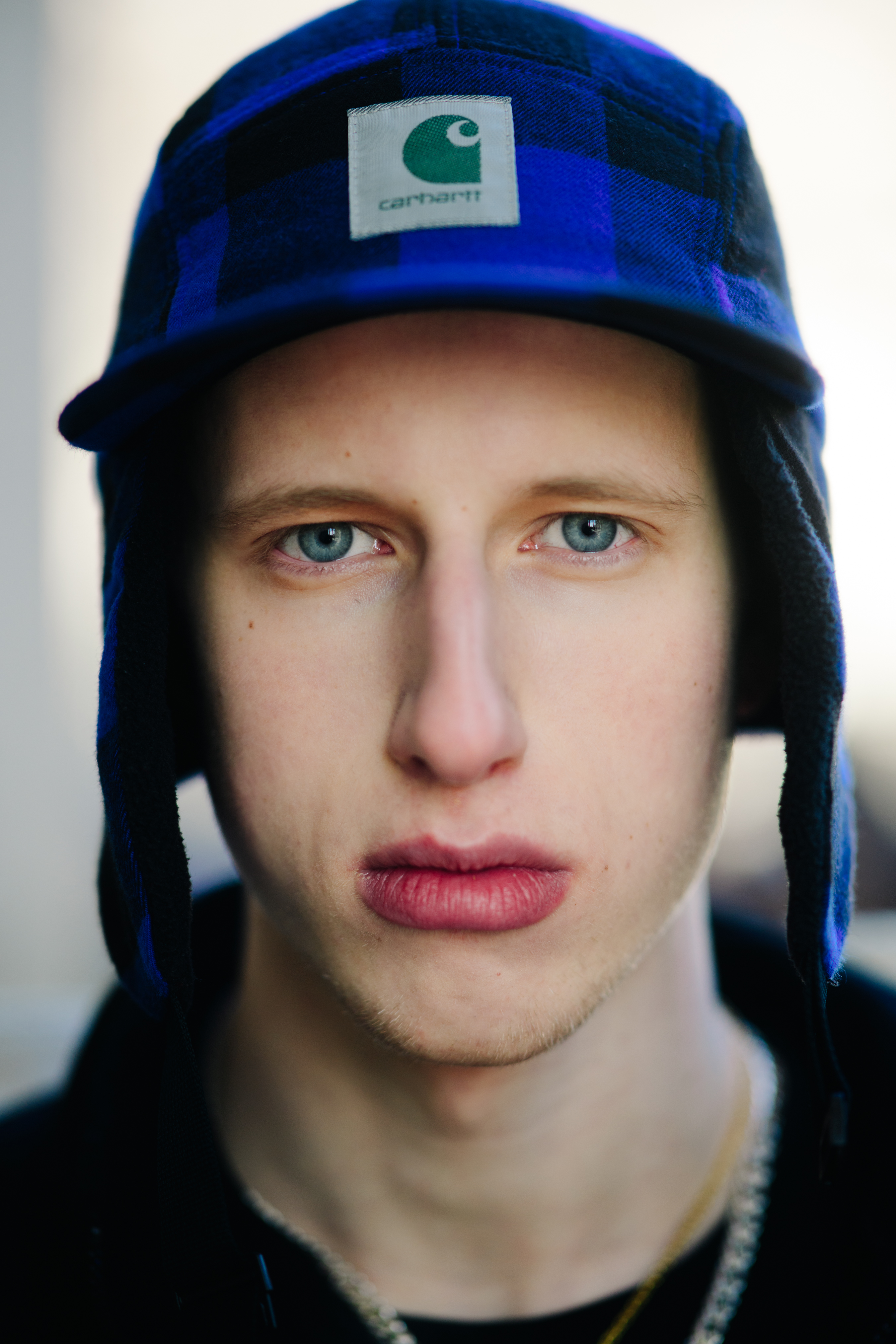 Portrait of model with Carthartt hat