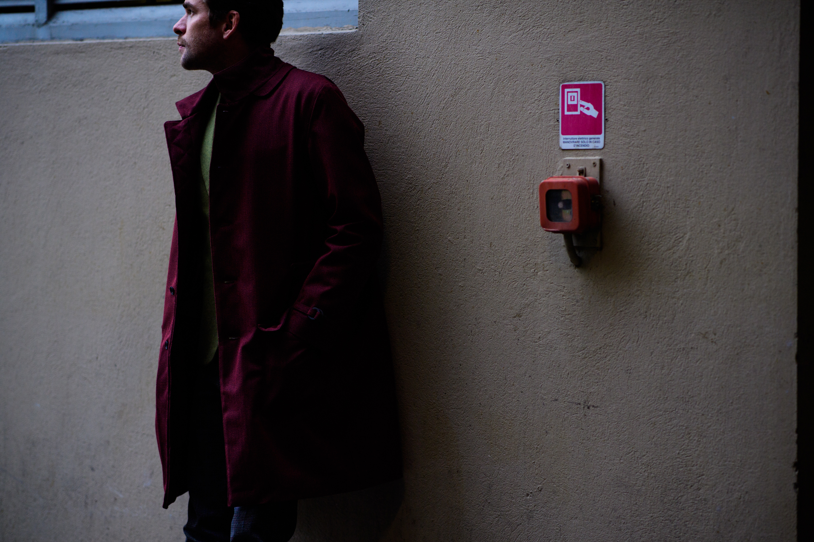 Man wearing vinous jacket