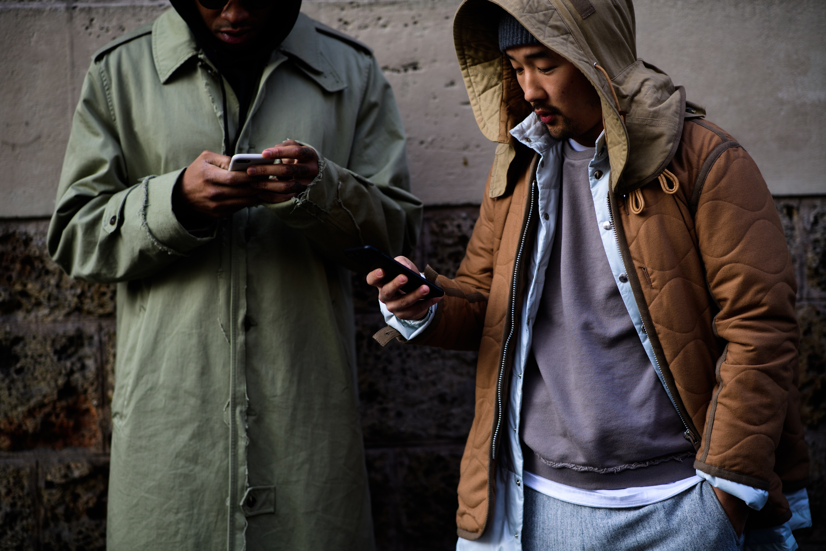 Man wearing green cloak