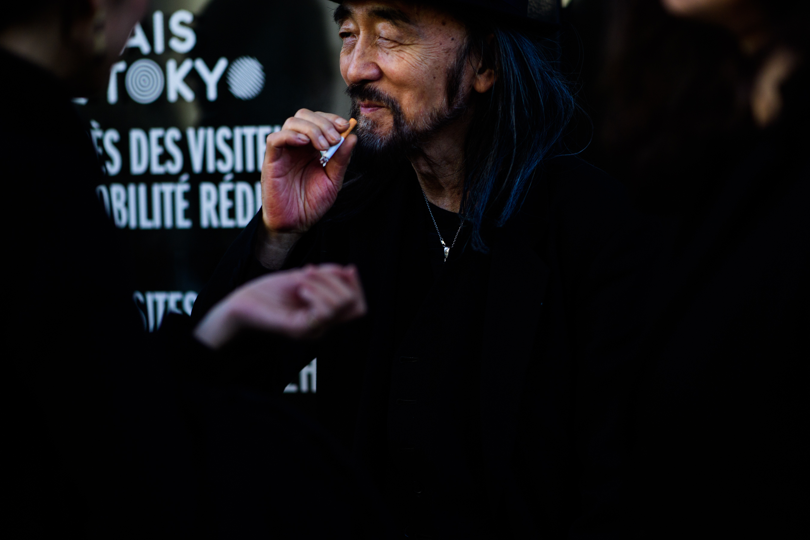 Asian man with cigarette