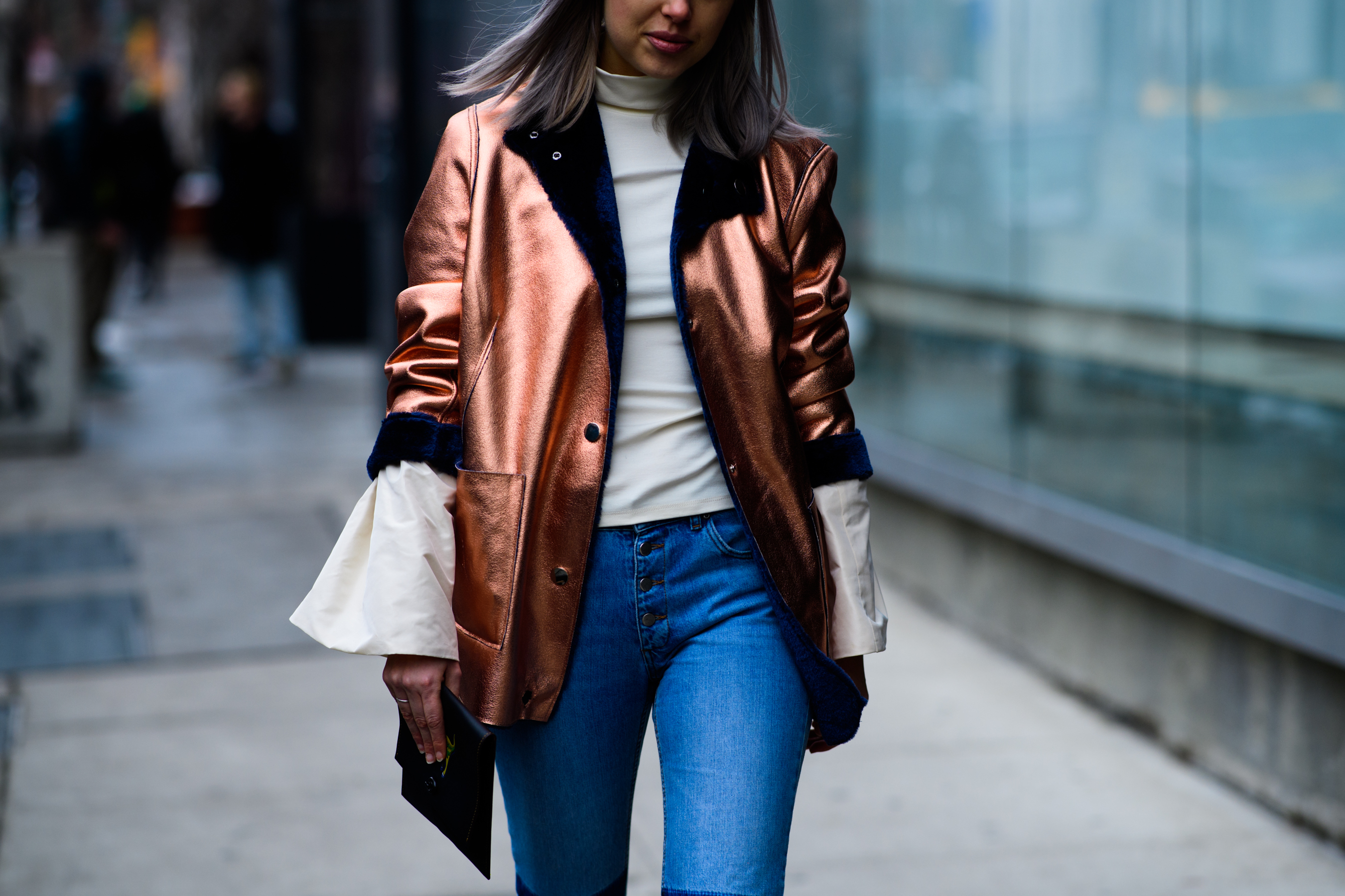 Woman wearing golden jacket