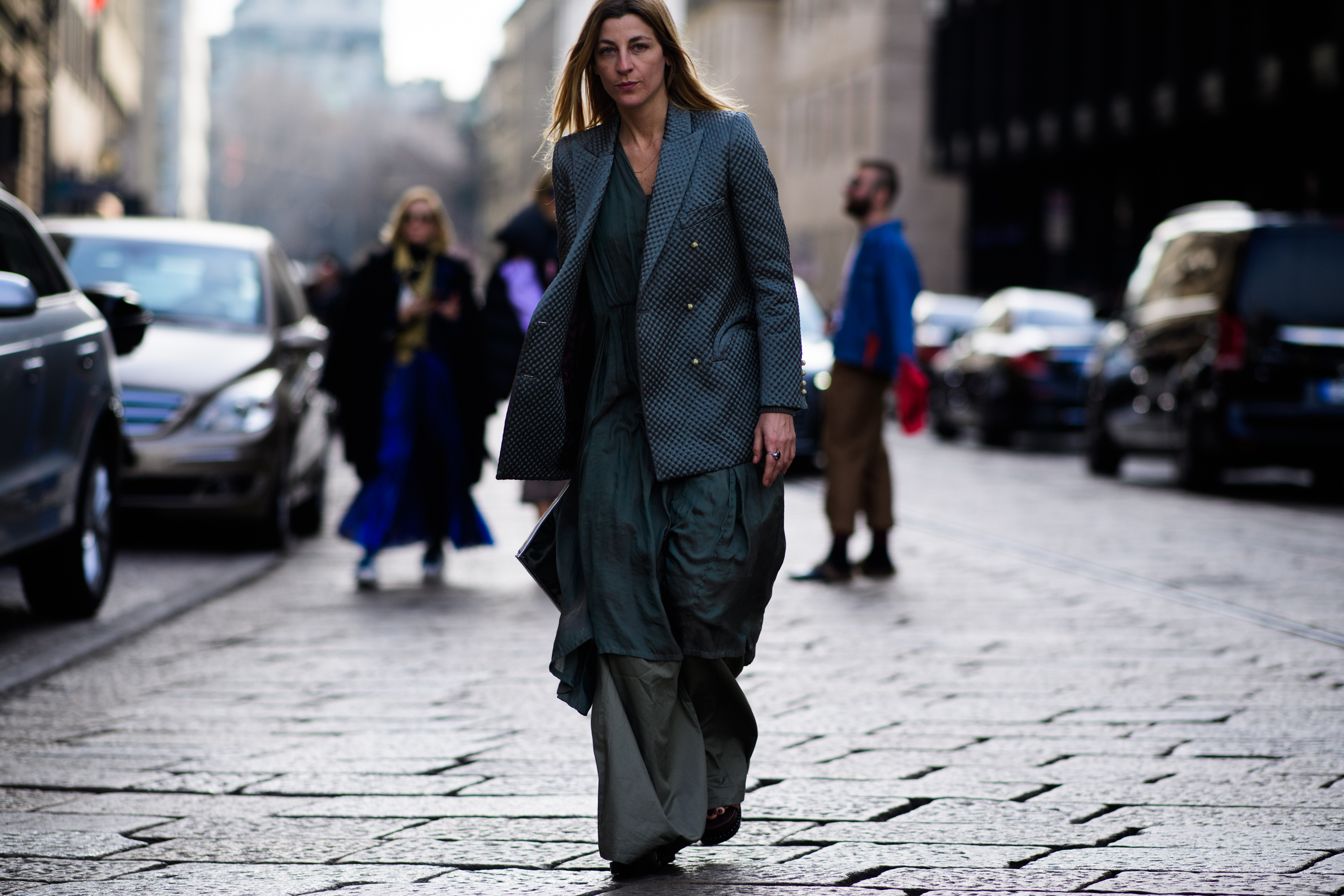 Italian stylist wearing grey suit