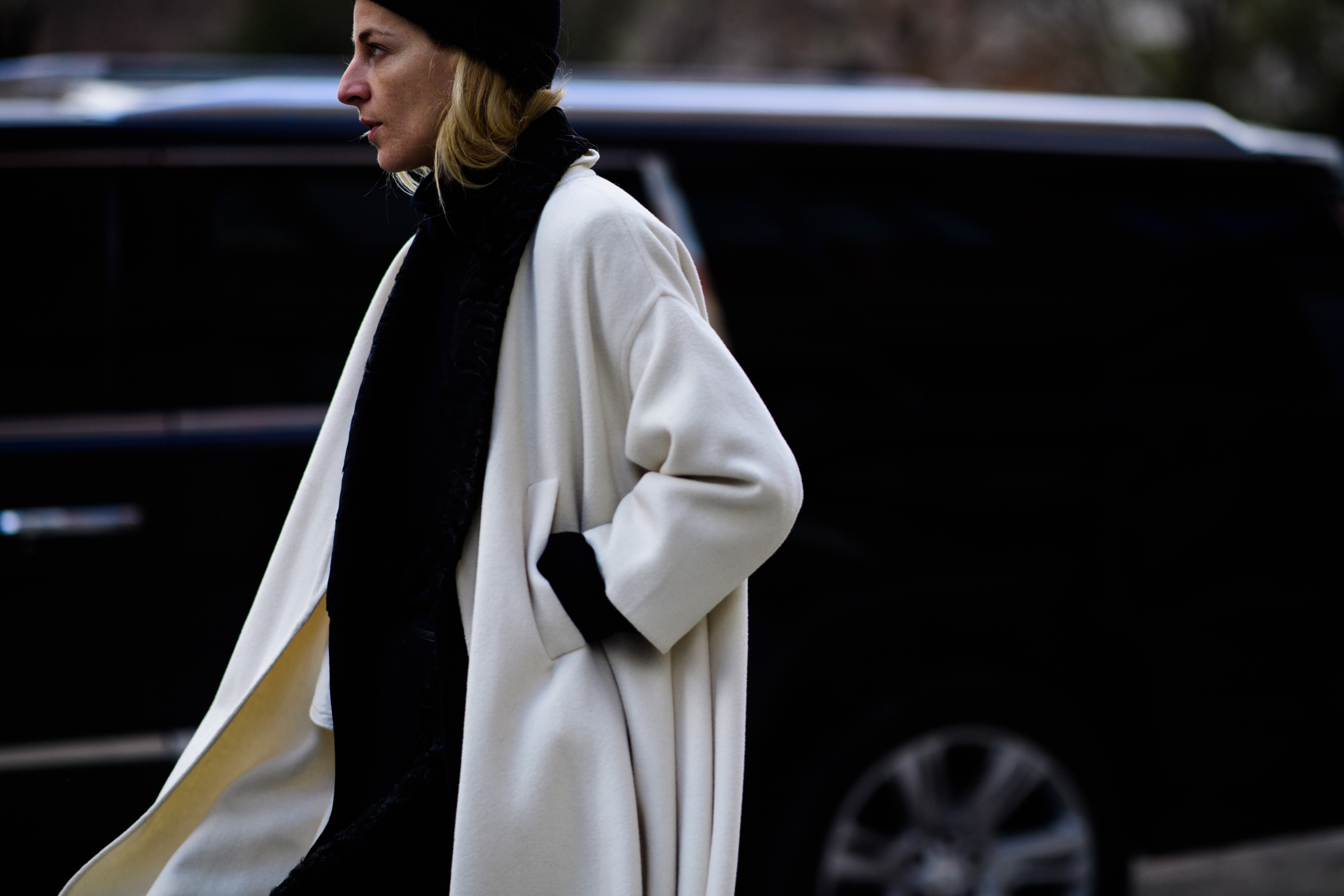 Italian stylist wearing white coat