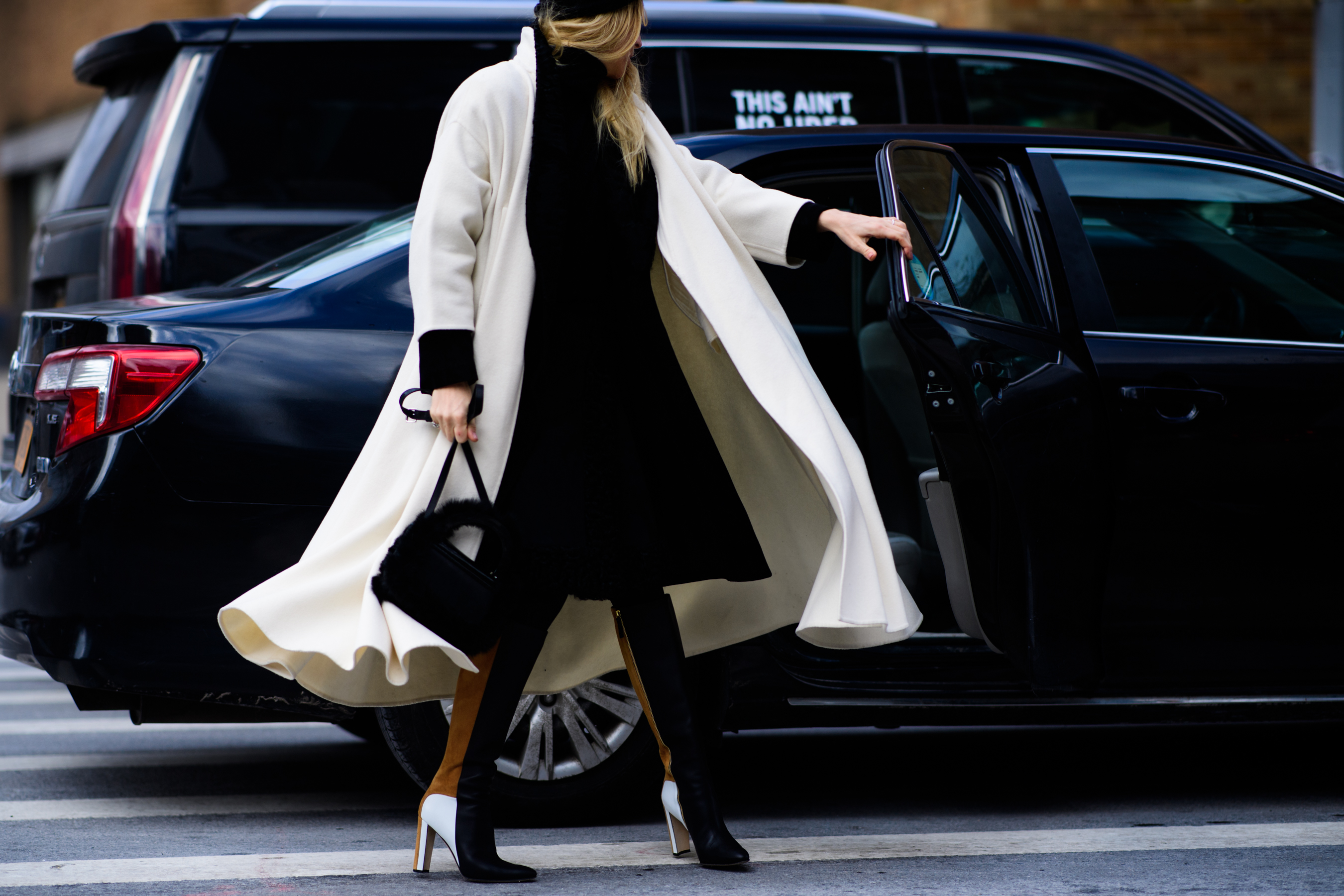 Italian stylist wearing white coat