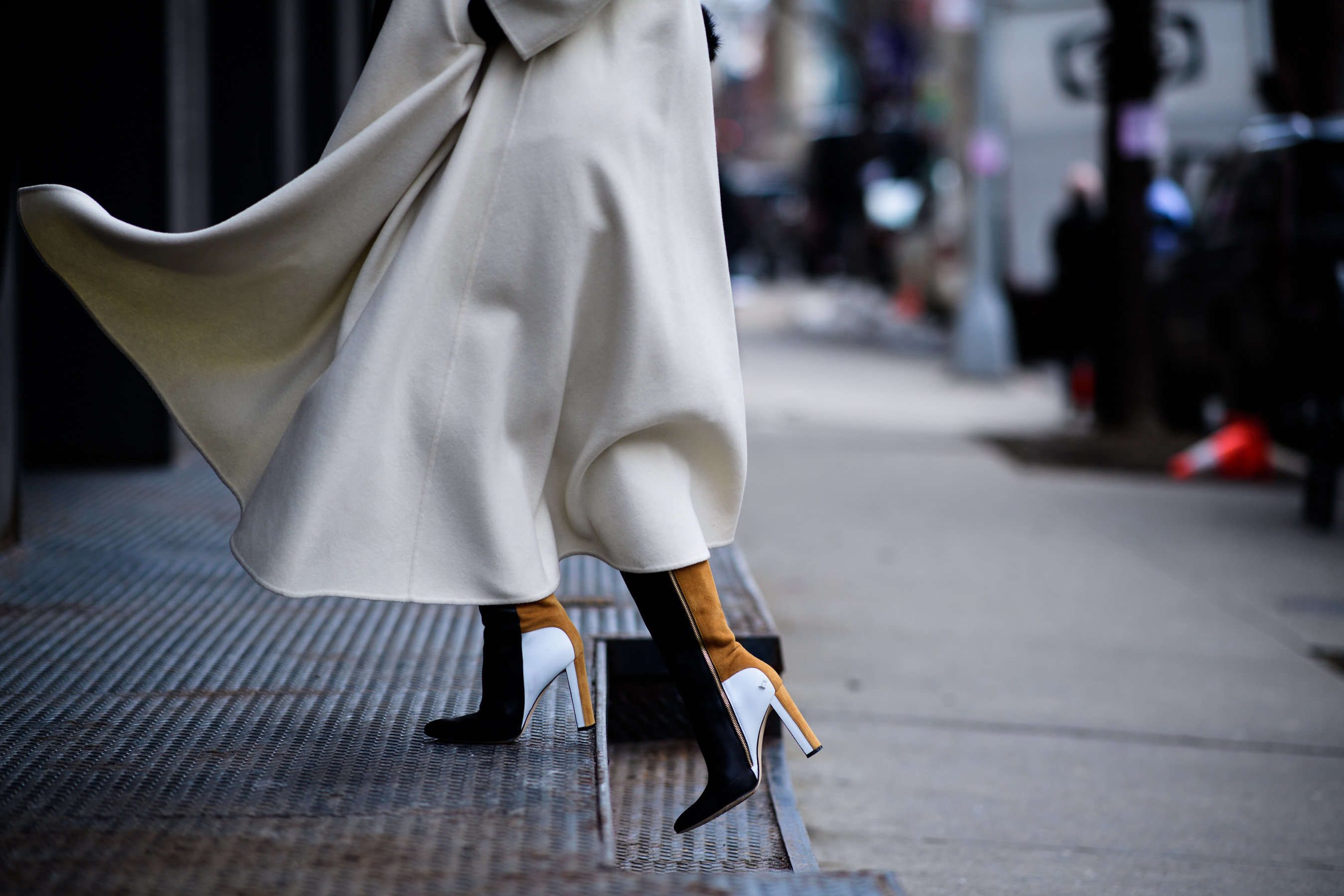 Italian stylist wearing white coat