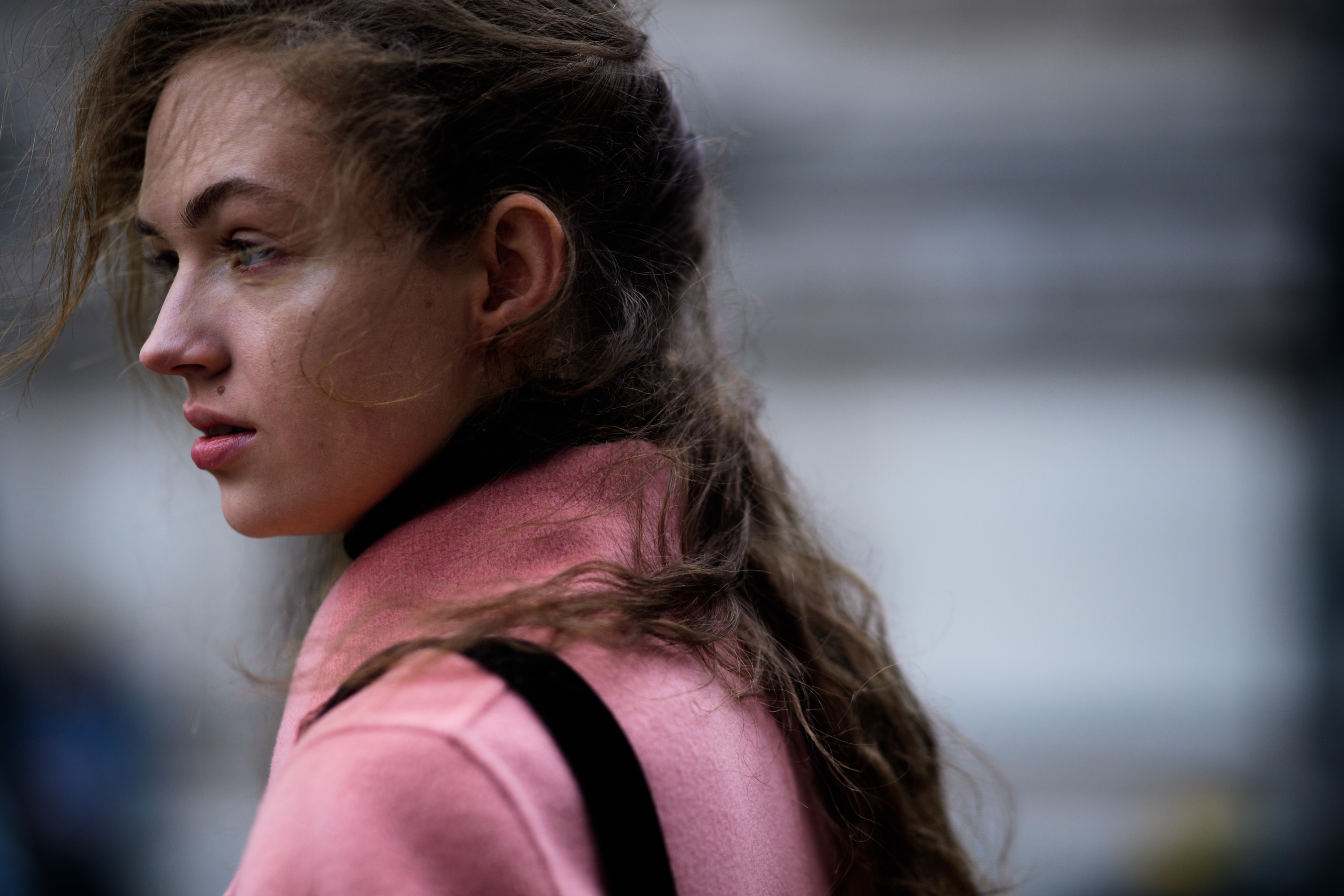 Woman wearing pink jacket