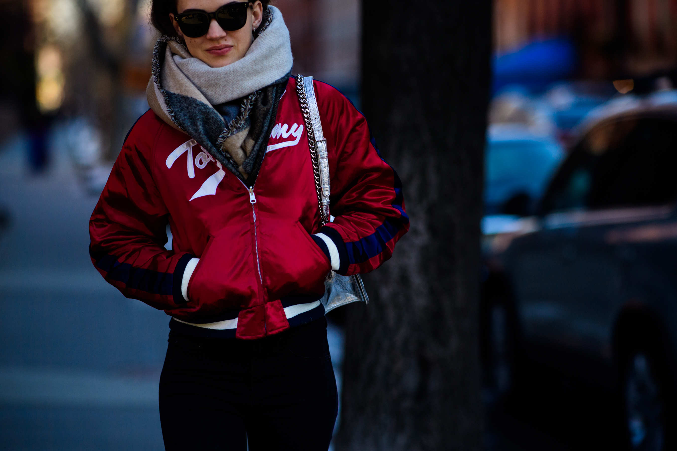 Model wearing red Tommy Hilfiger bomber