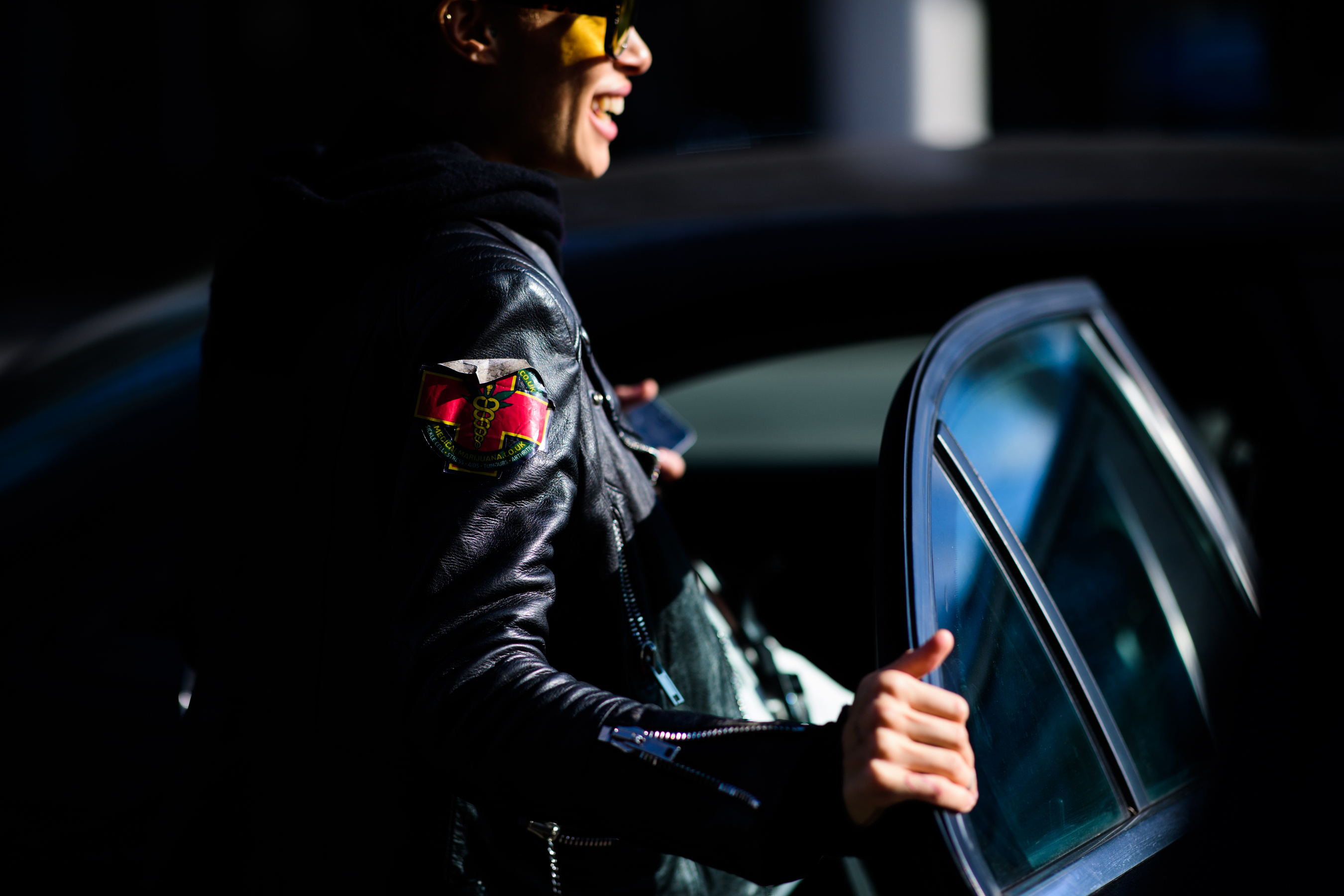 American model wearing leather jacket