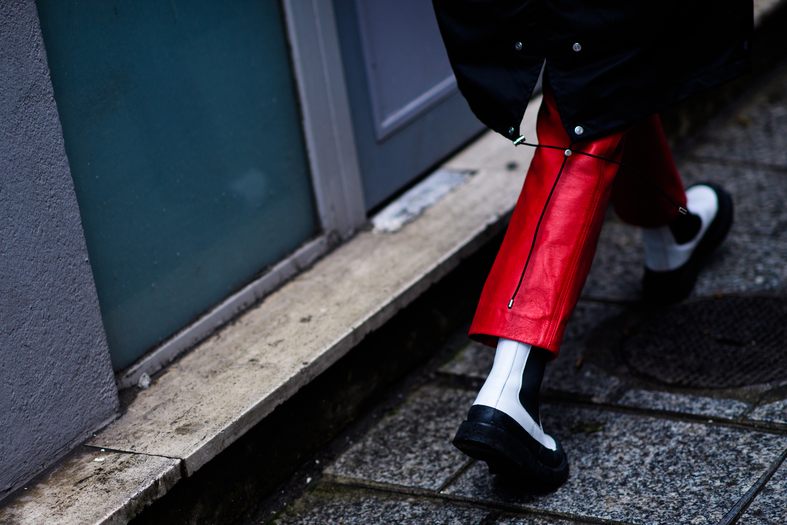 Woman wearing white Céline boots