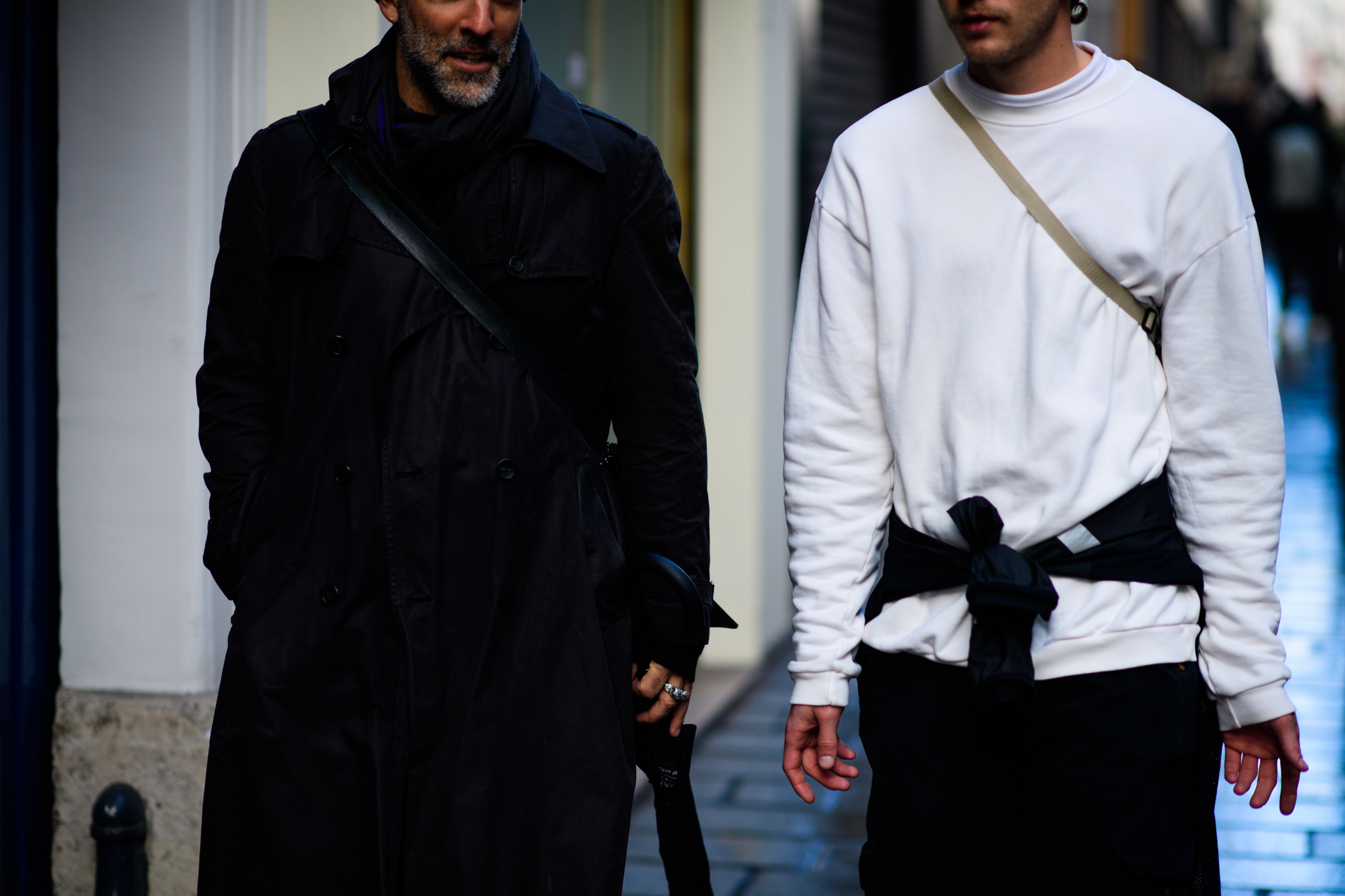 Two men wearing black and white
