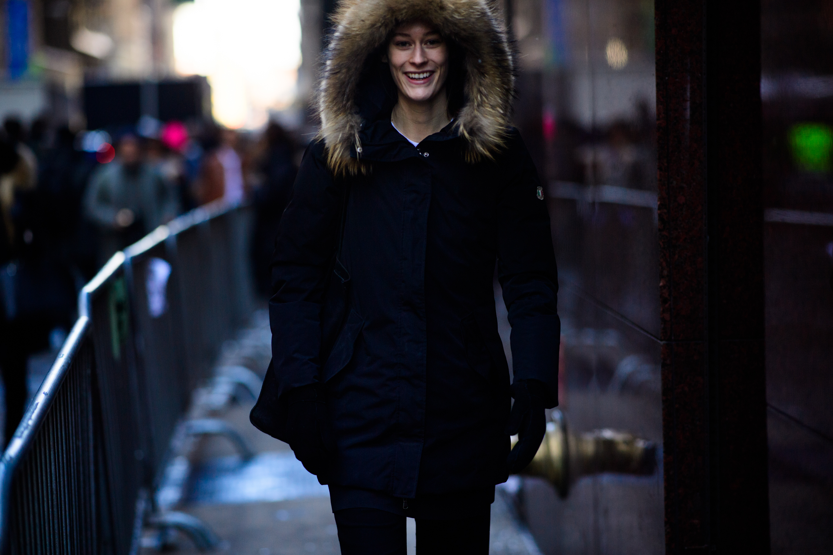 Woman wearing fur hood