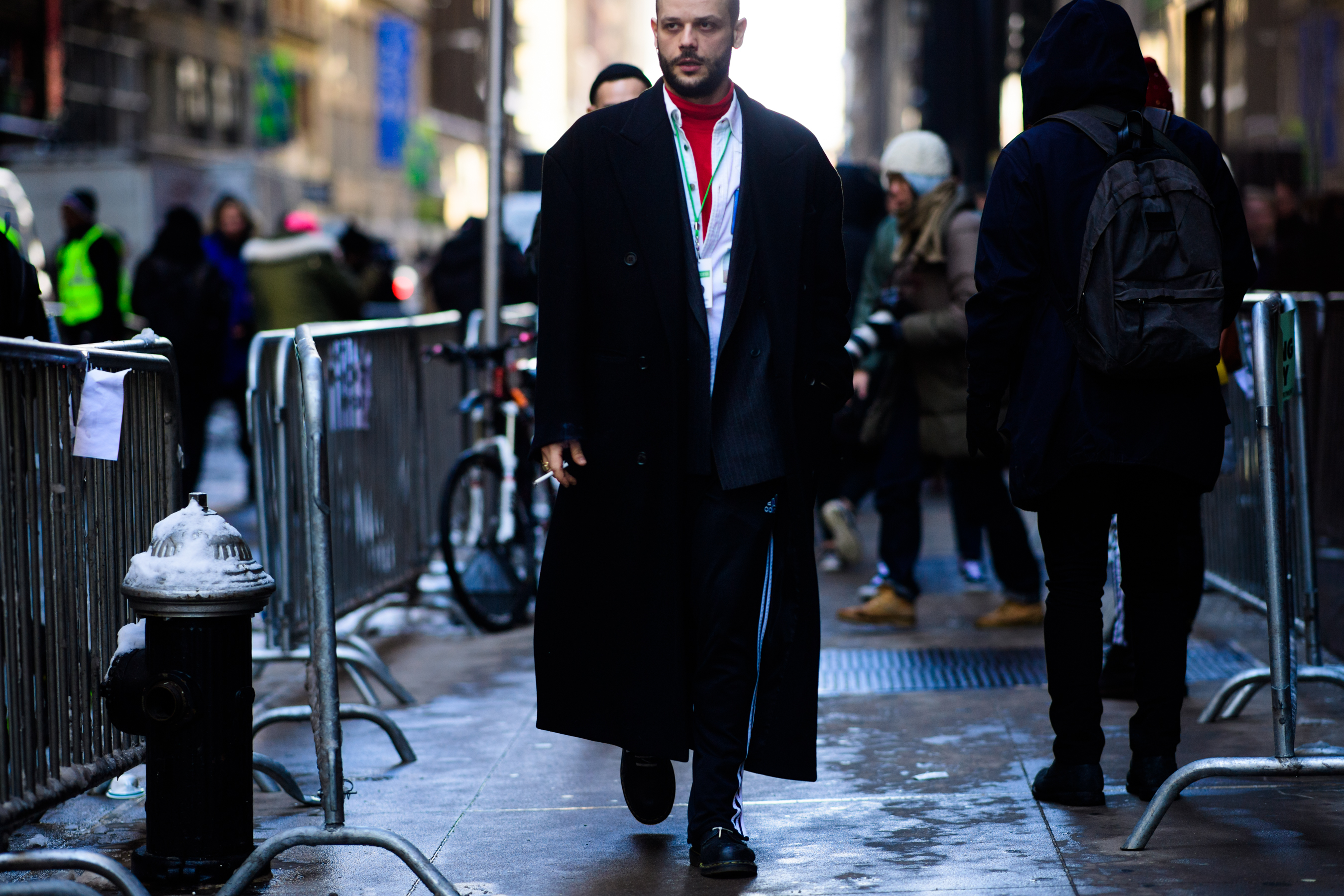 Man wearing Adidas pants