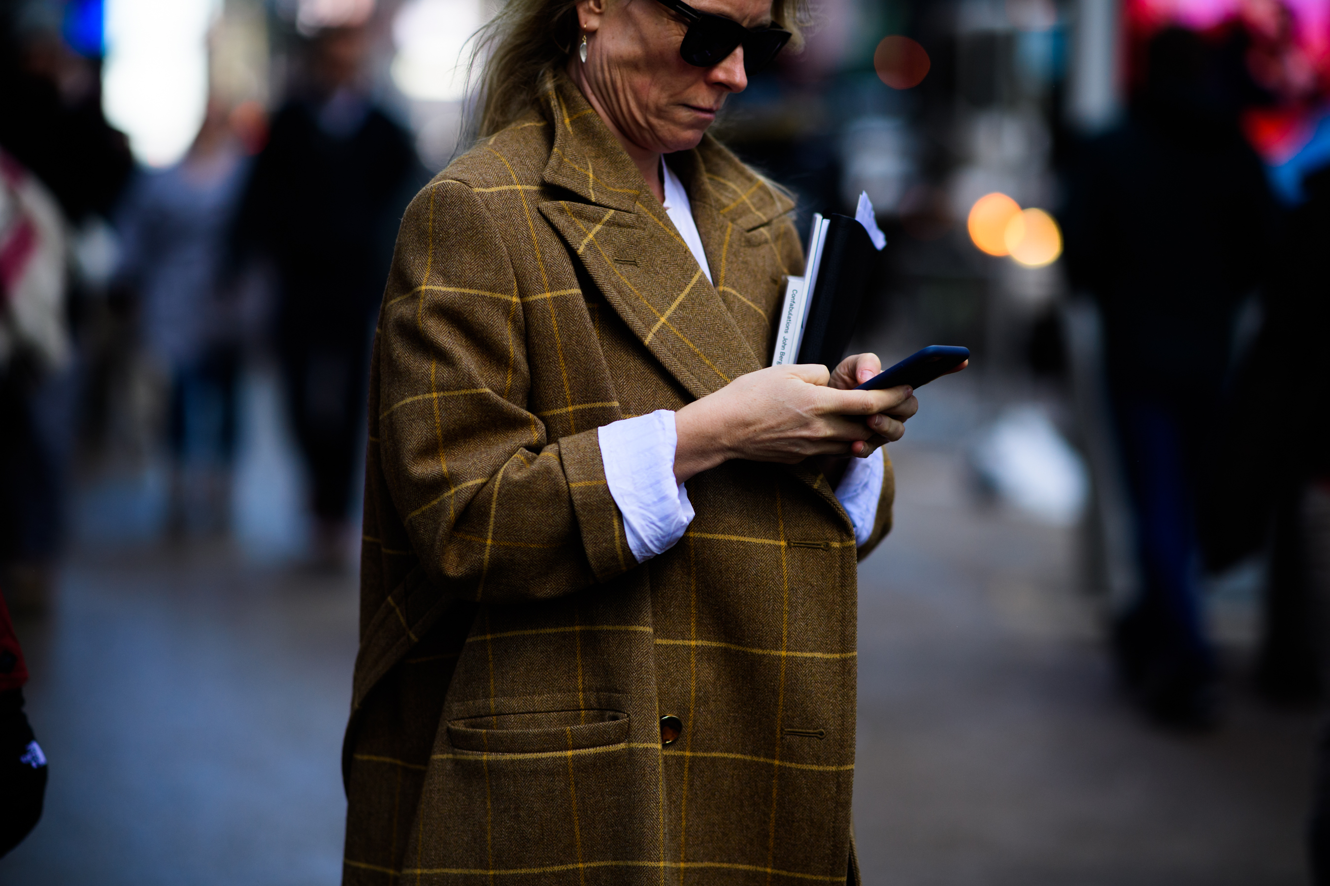 Woman wearing brown coat