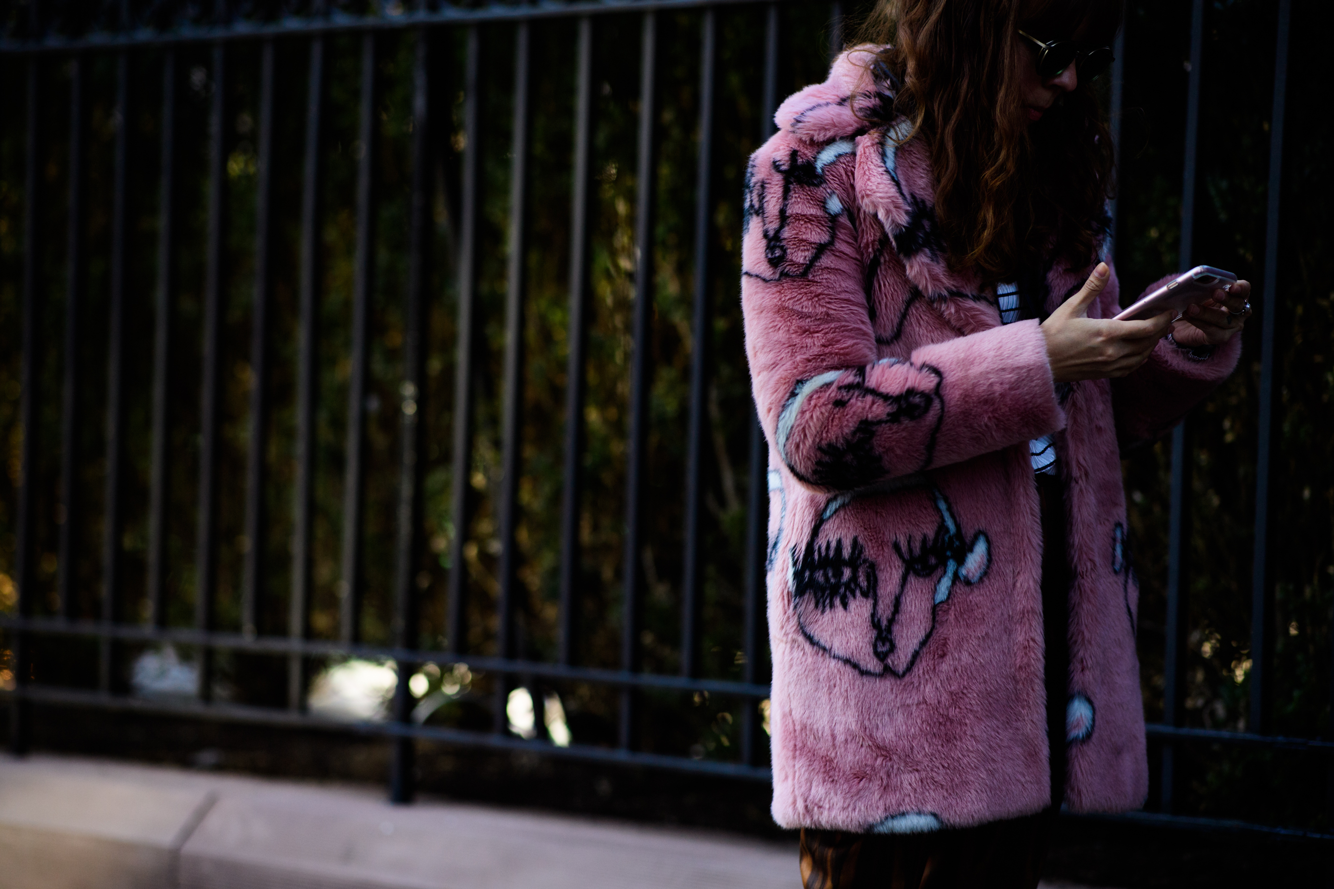 Woman wearing pink coat
