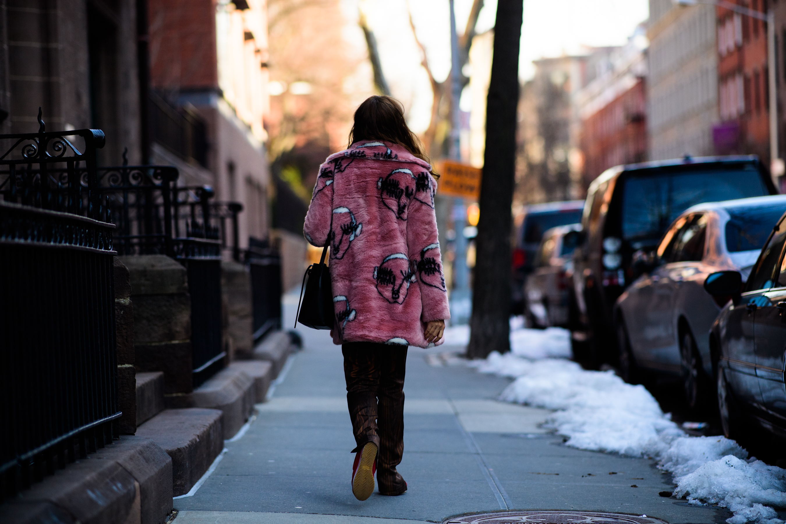 Woman wearing pink coat