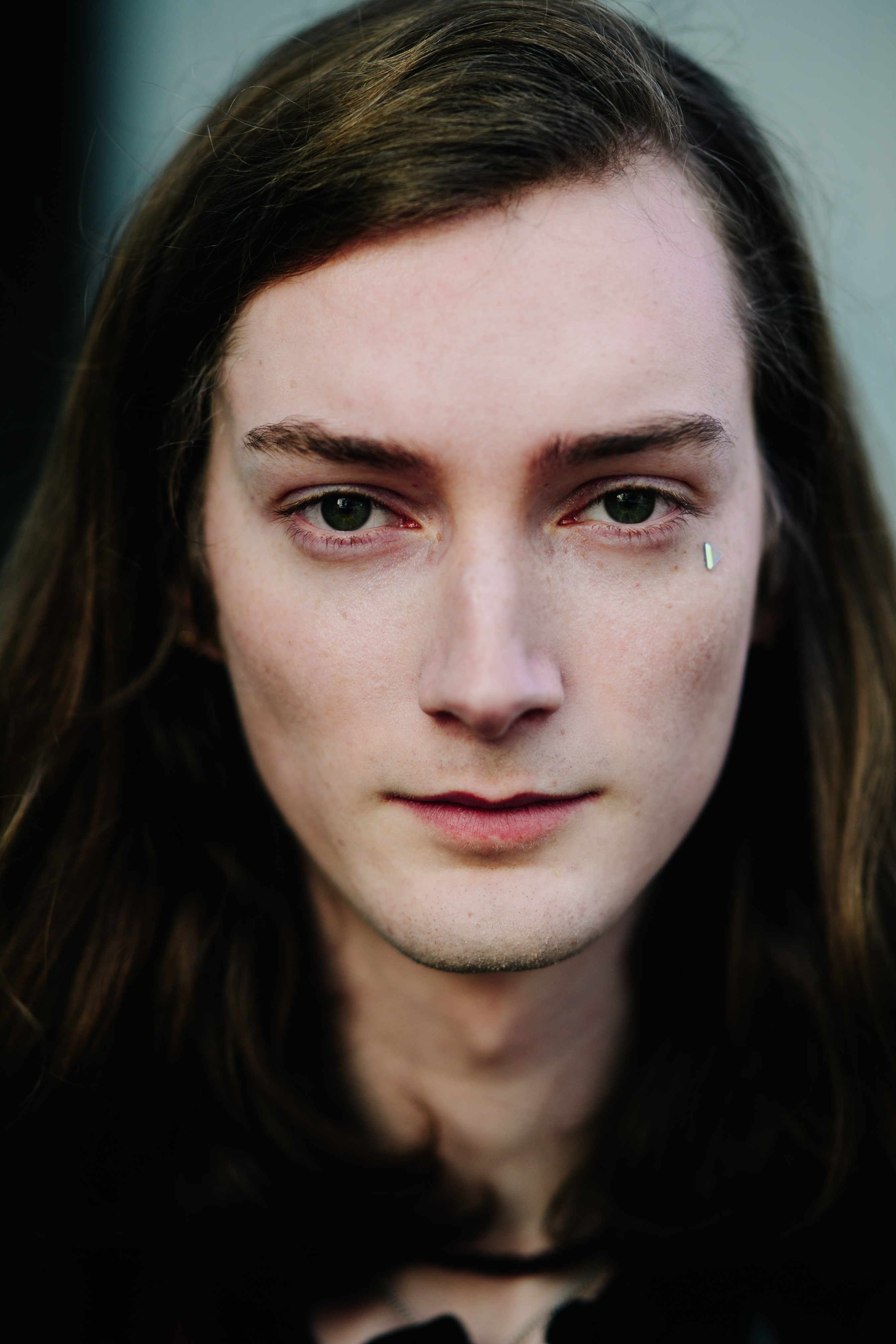 Portrait of male model with long hair