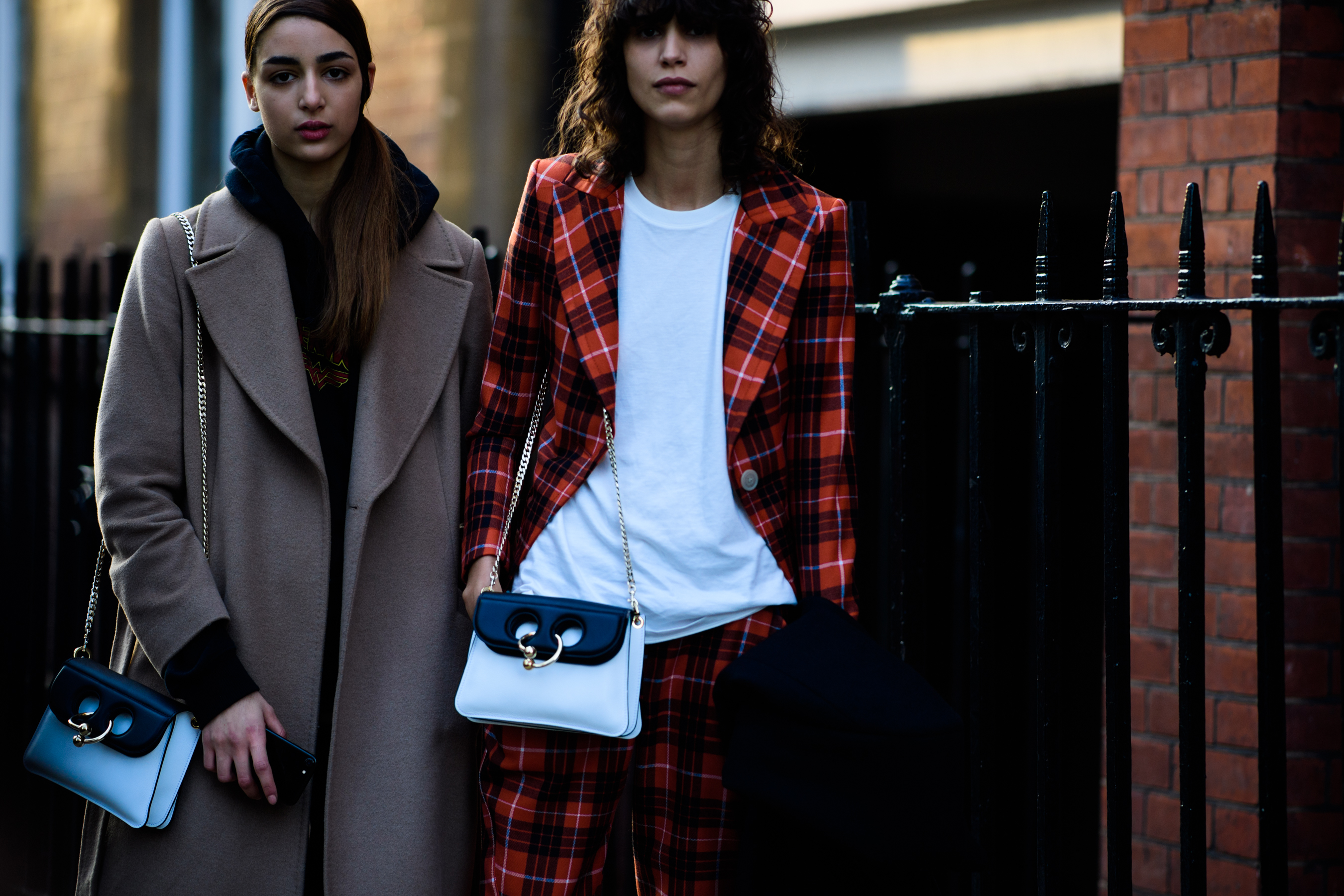 Models wearing J.W.Anderson bags