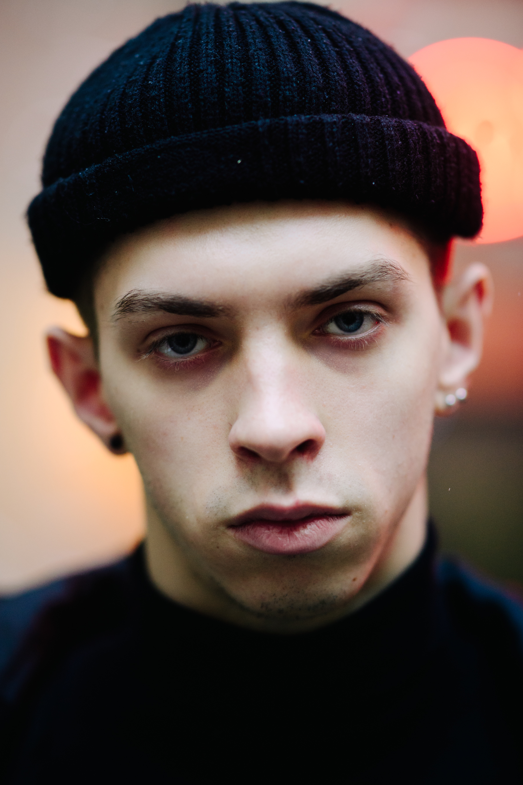 Ukrainian male model wearing black hat