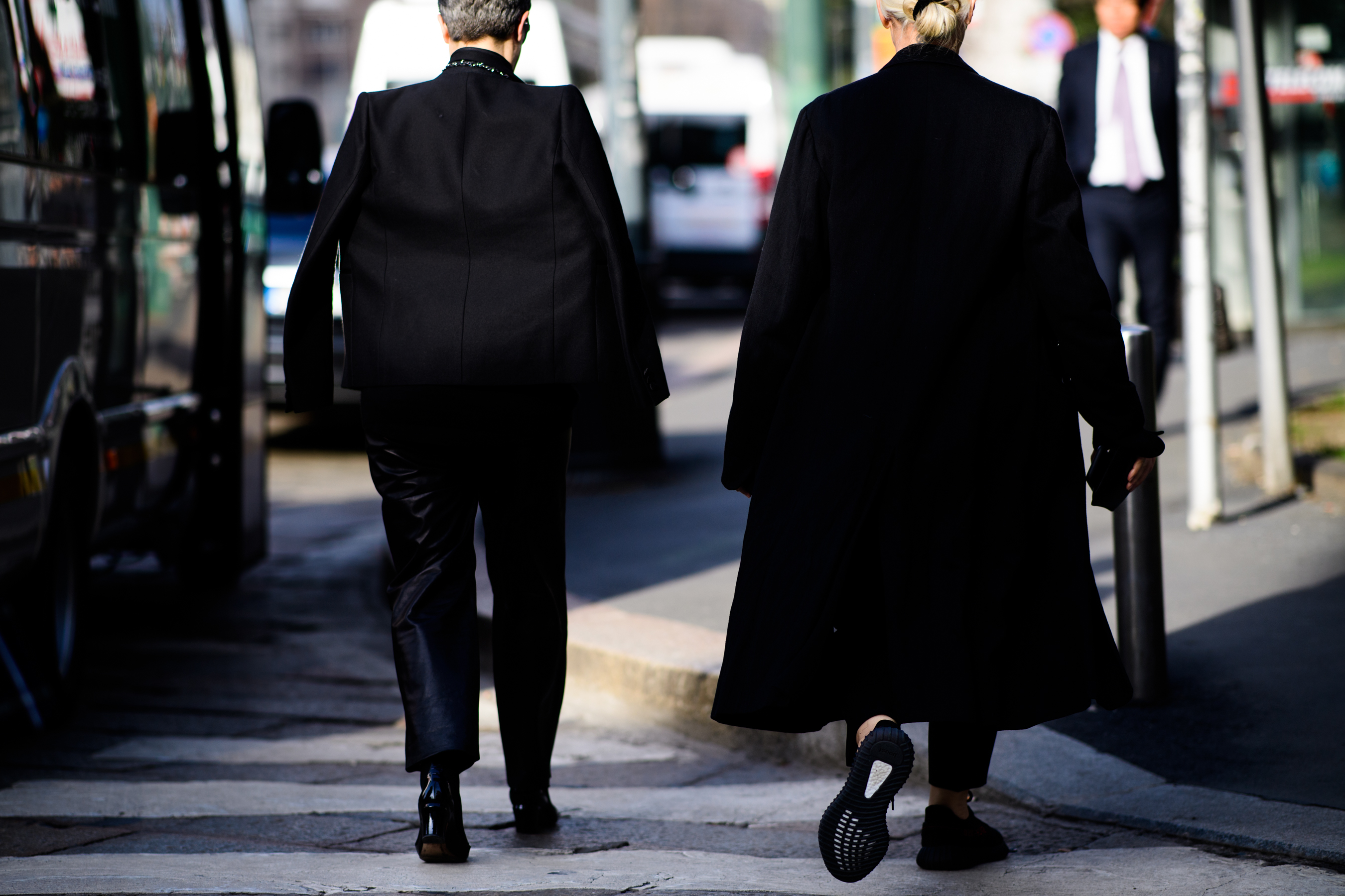 Woman wearing black suits