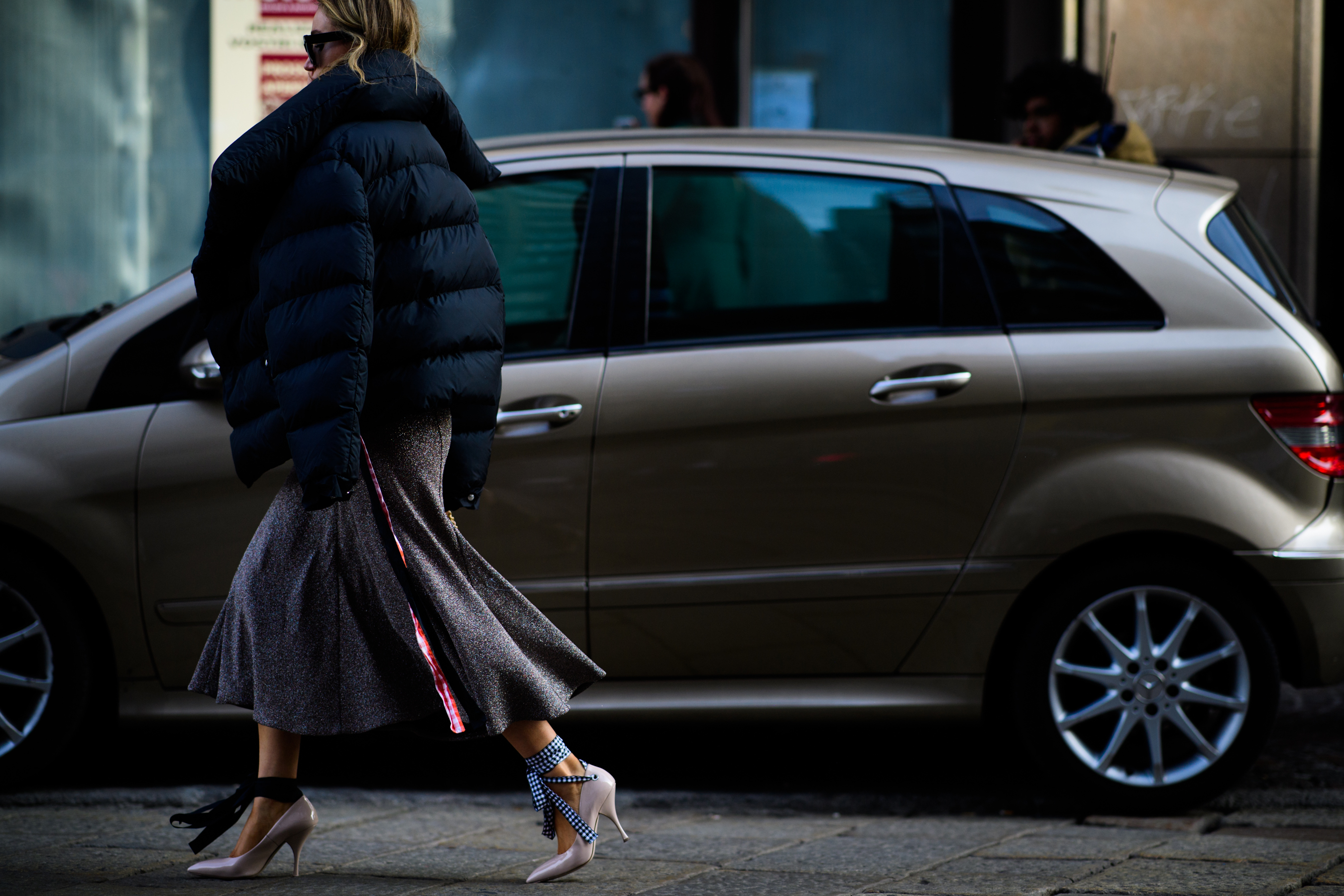 Woman wearing black puffer jacket