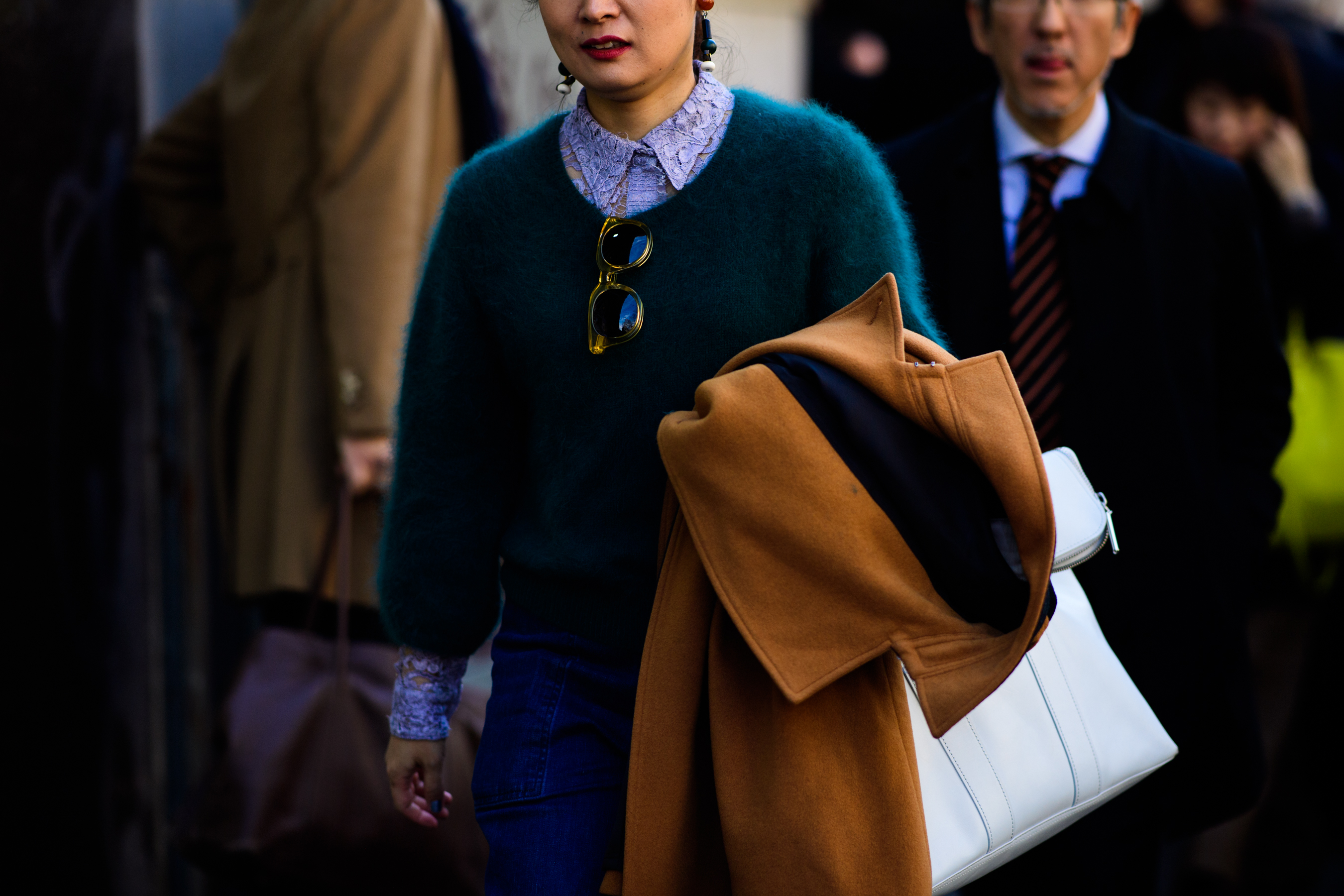Woman wearing green sweater